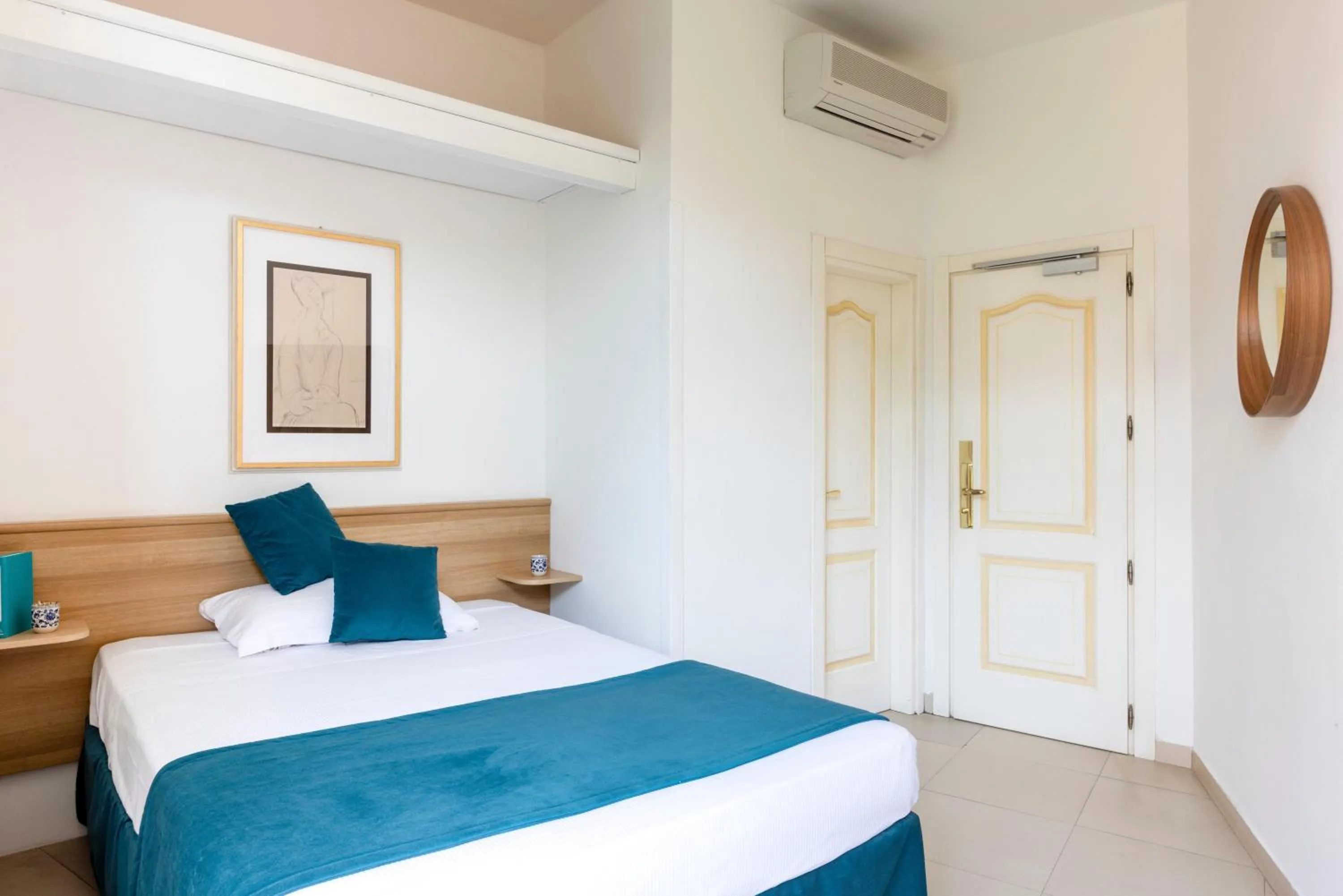 Photo of the whole room in Hotel Capo D'Uomo