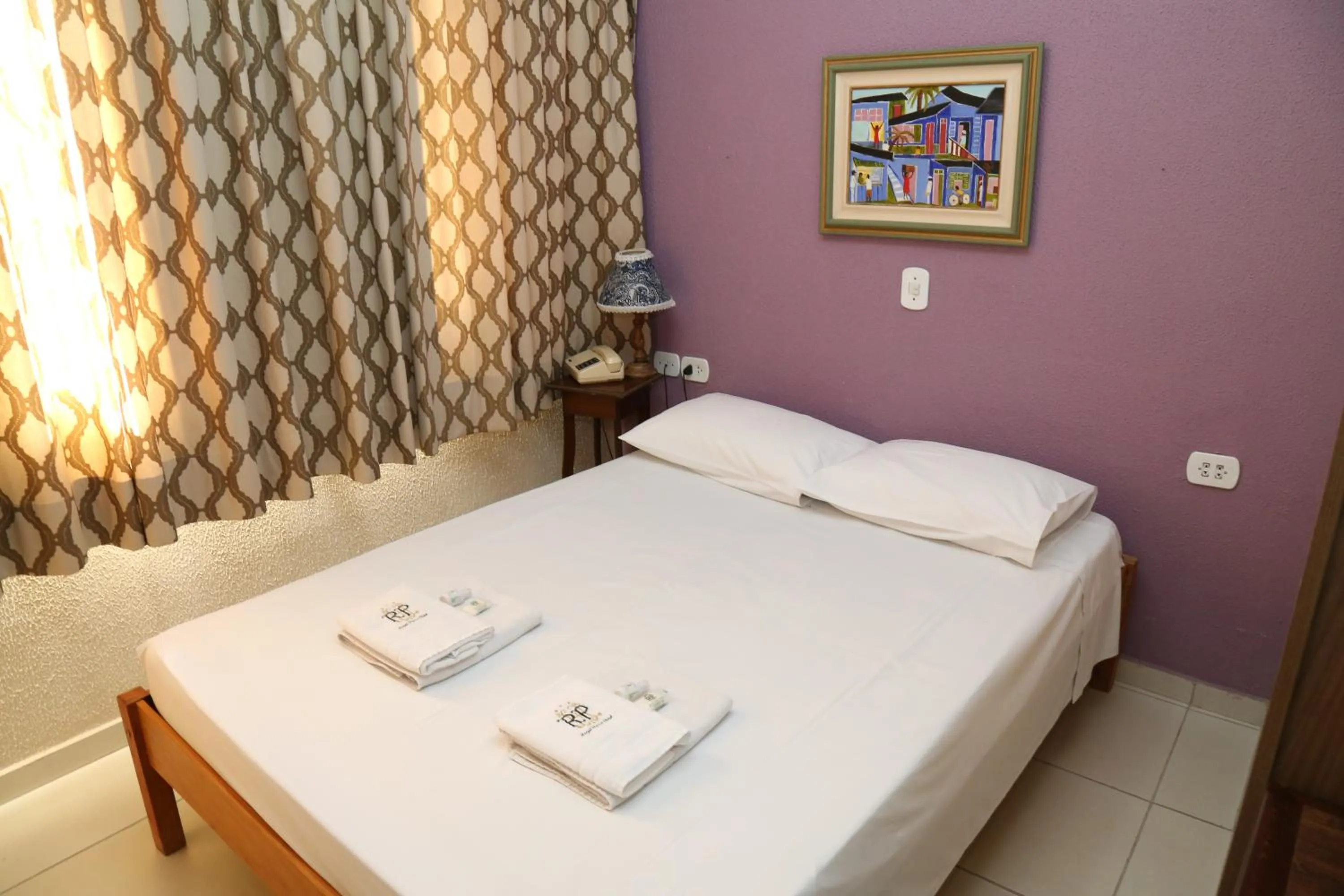 Bed in CHA Royal Plaza Hotel