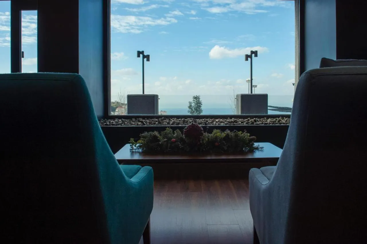 Seating area in Le Pave Hotel