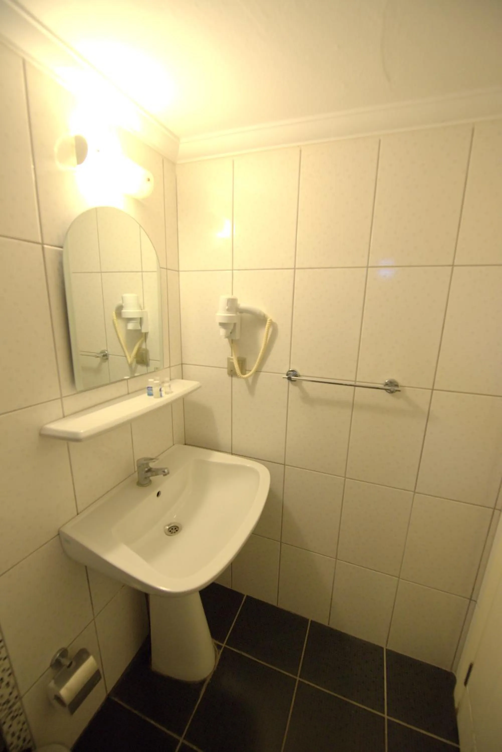 Bathroom in Delfi Hotel Spa & Wellness Center