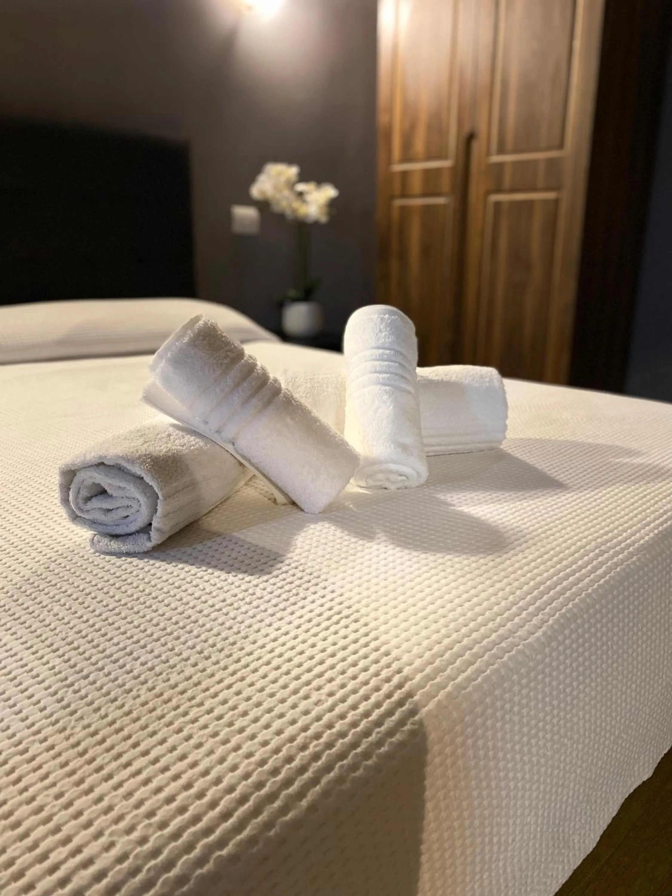 towels, Bed in Palazzo Oliveto