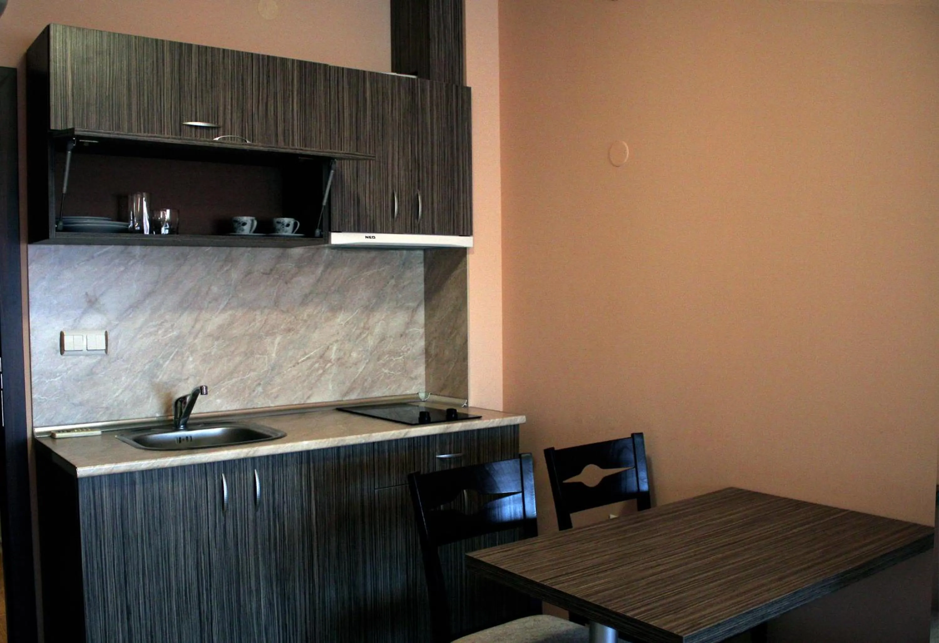 Kitchen or kitchenette in Aparthotel Pine Hills Pamporovo