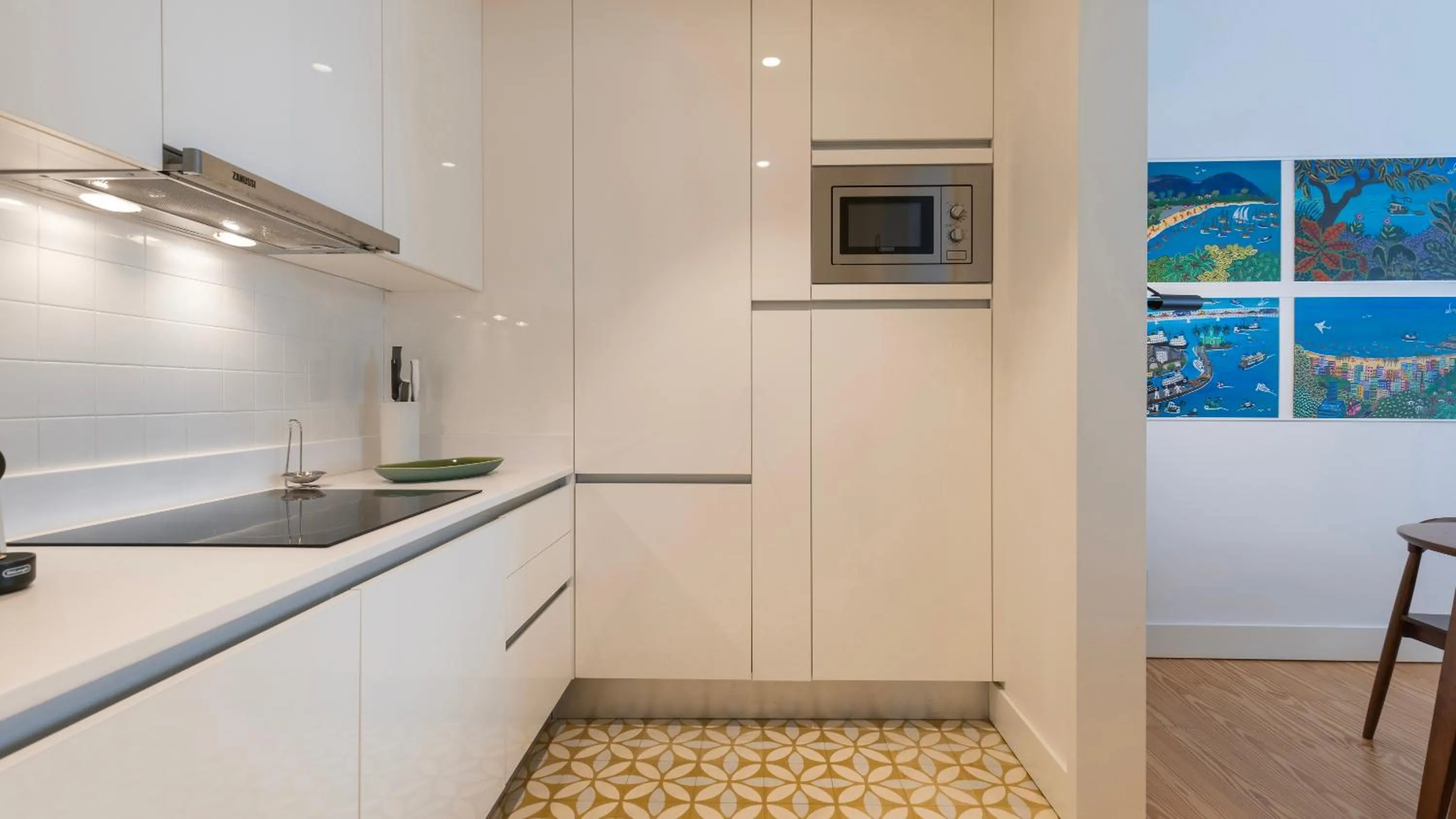 Kitchen or kitchenette in Downtown by the River Apartment by LovelyStay