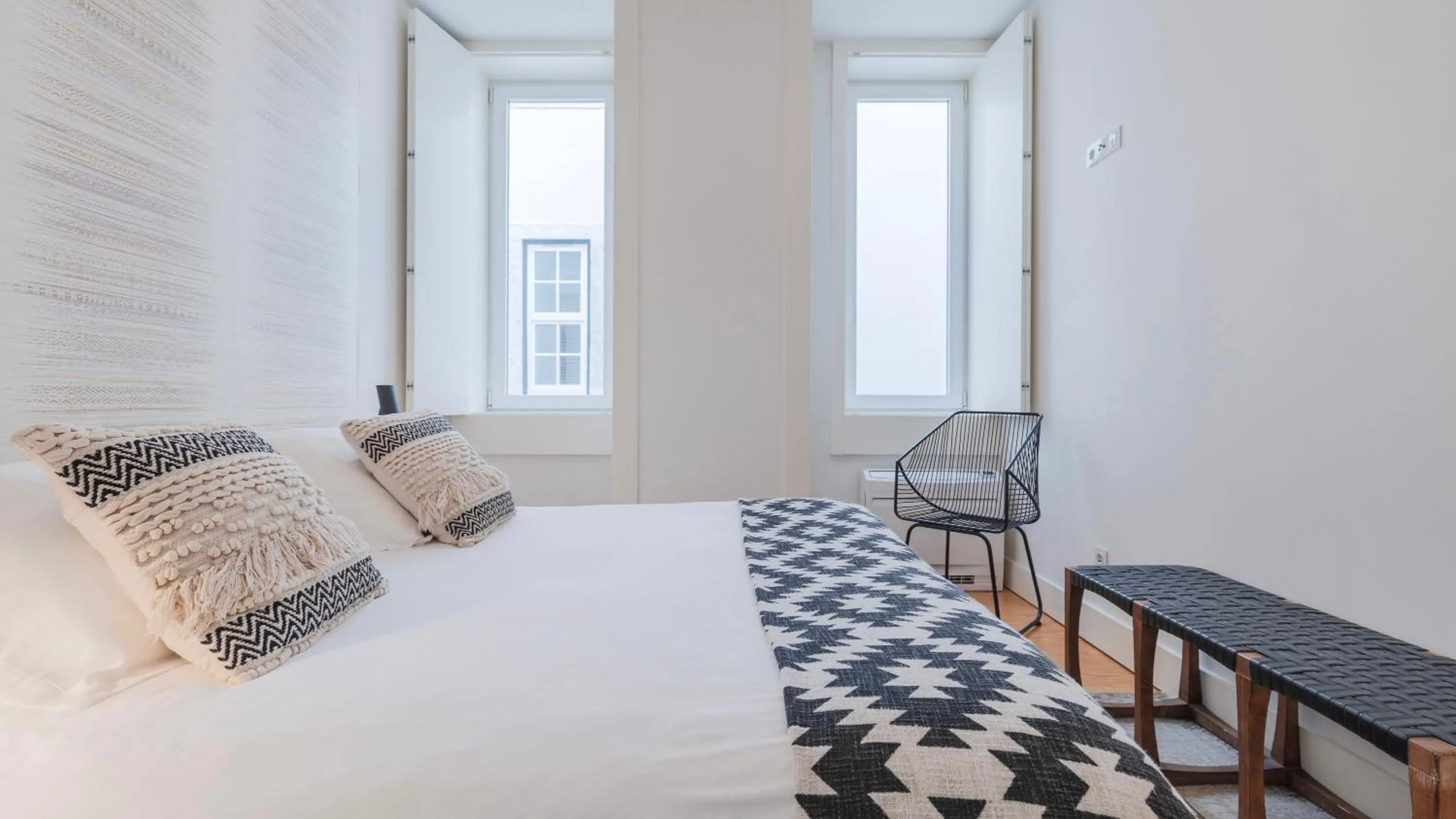 Living room, Bed in Downtown by the River Apartment by LovelyStay