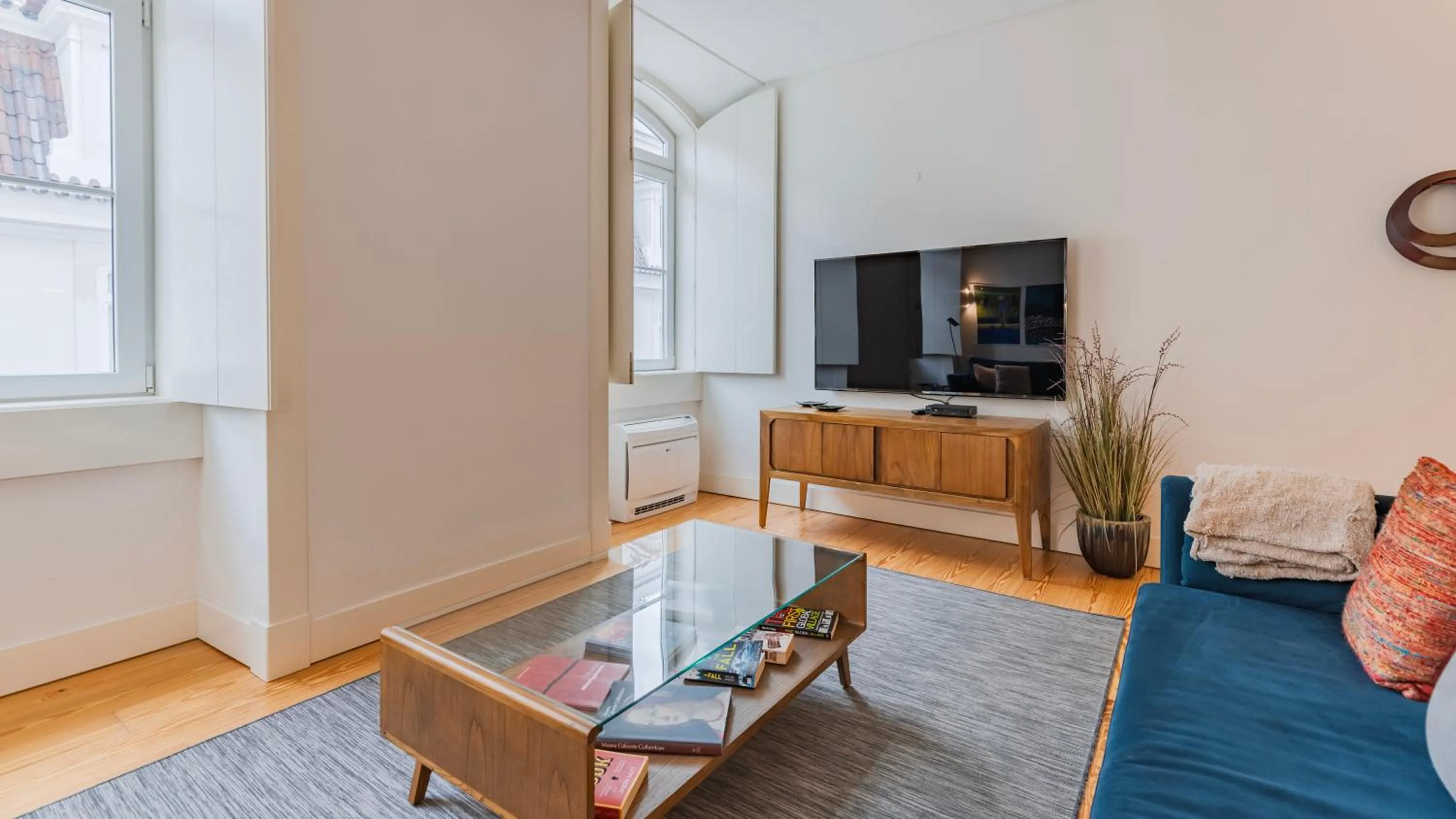 TV and multimedia in Downtown by the River Apartment by LovelyStay