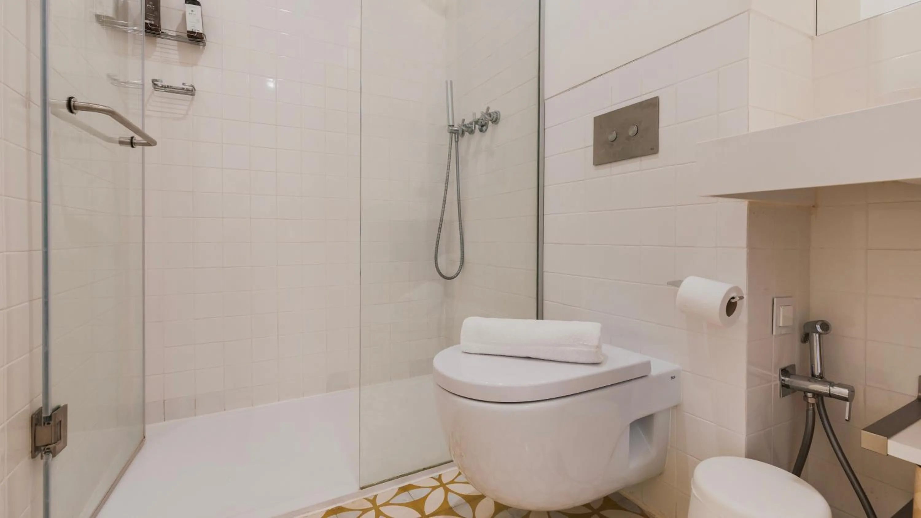 Bathroom in Downtown by the River Apartment by LovelyStay