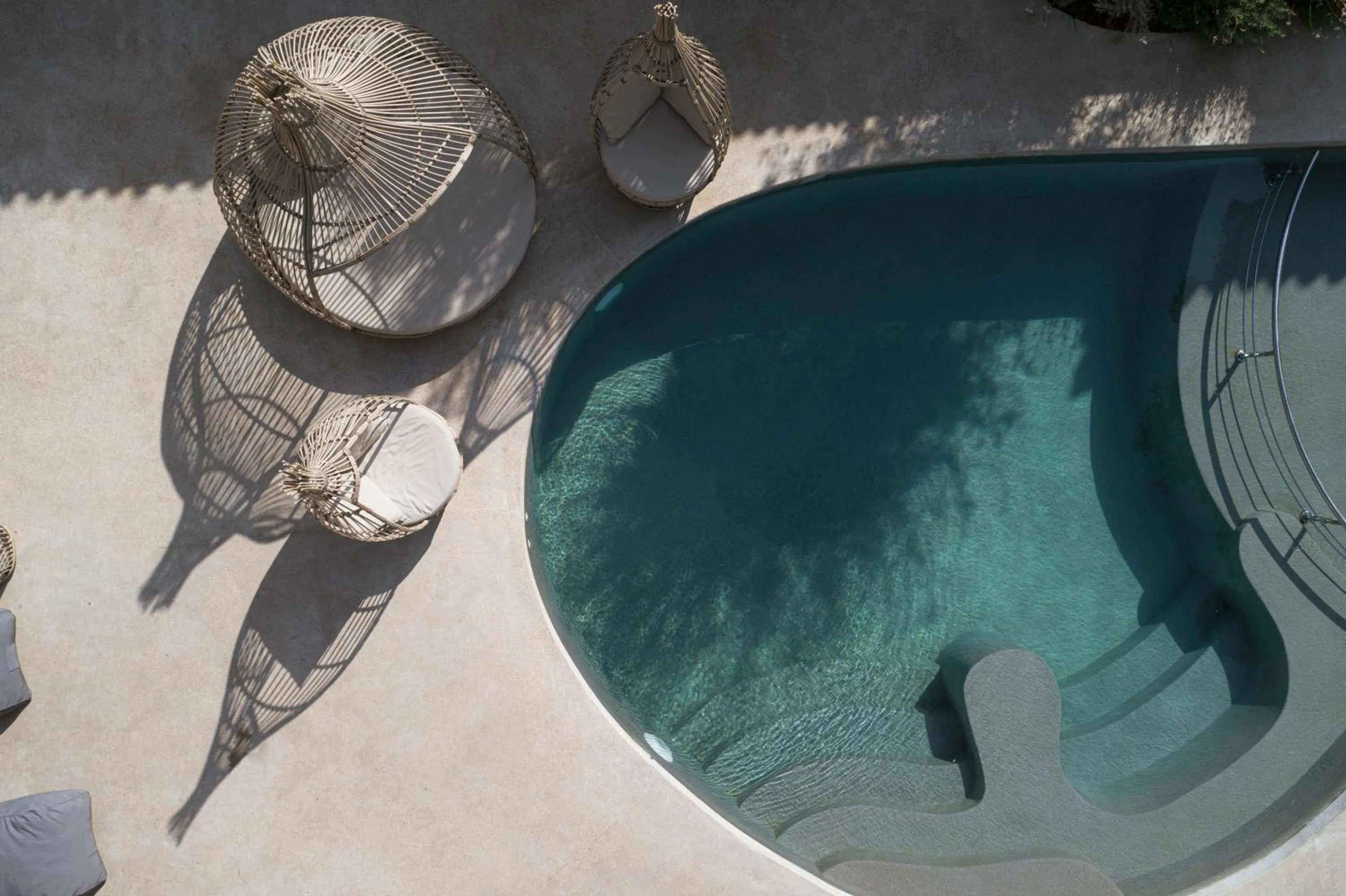 Swimming pool in Samian Mare Hotel, Suites & Spa