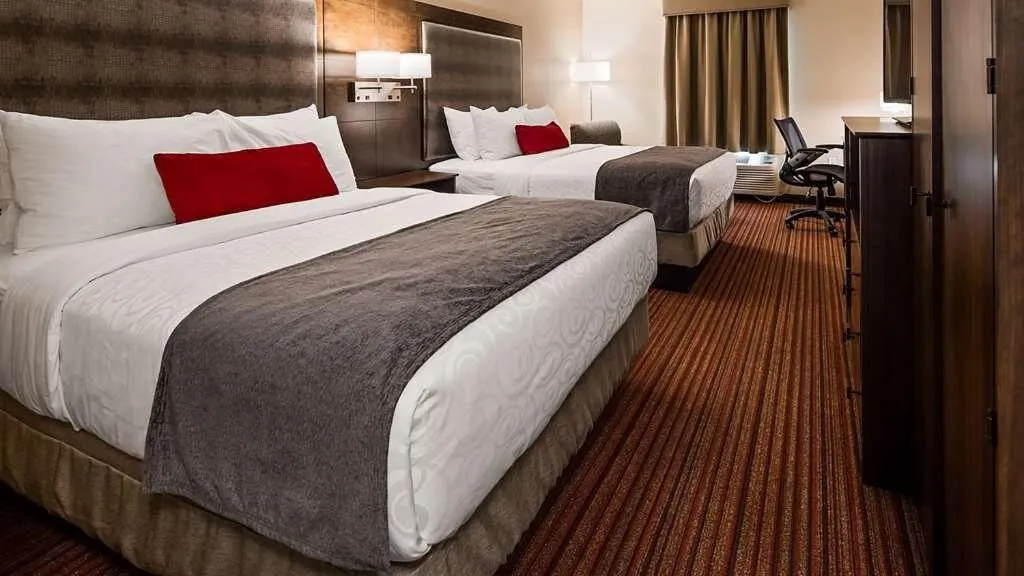 Bed in Country Inn & Suites by Radisson, Grandville-Grand Rapids West, MI