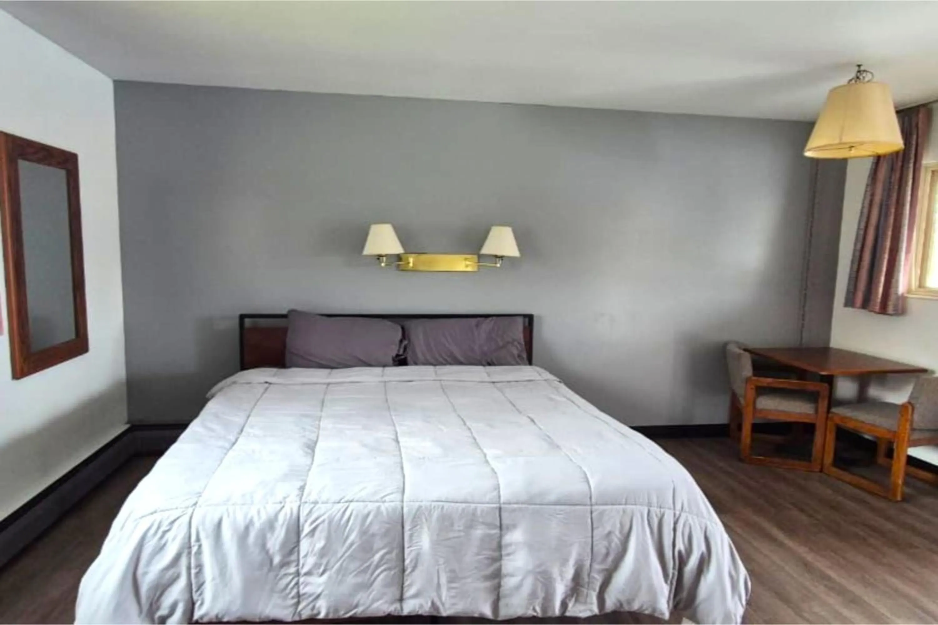 Bedroom, Bed in Capital O Swan Inn Comstock Park