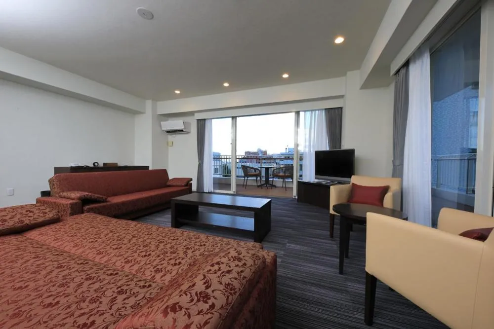 Communal lounge/ TV room in Terrace Garden Mihama Resort by Coldio Premium