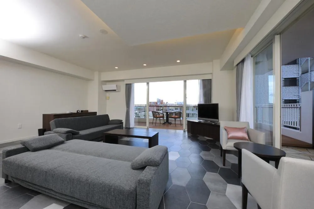 Communal lounge/ TV room in Terrace Garden Mihama Resort by Coldio Premium