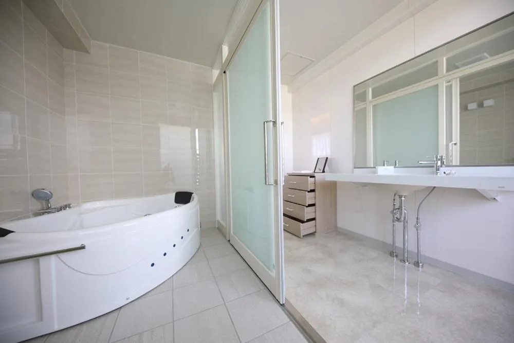 Shower in Terrace Garden Mihama Resort by Coldio Premium