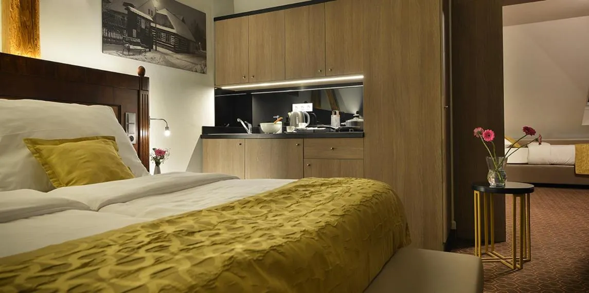 Kitchen or kitchenette, Bed in Vysocina Design Apartments