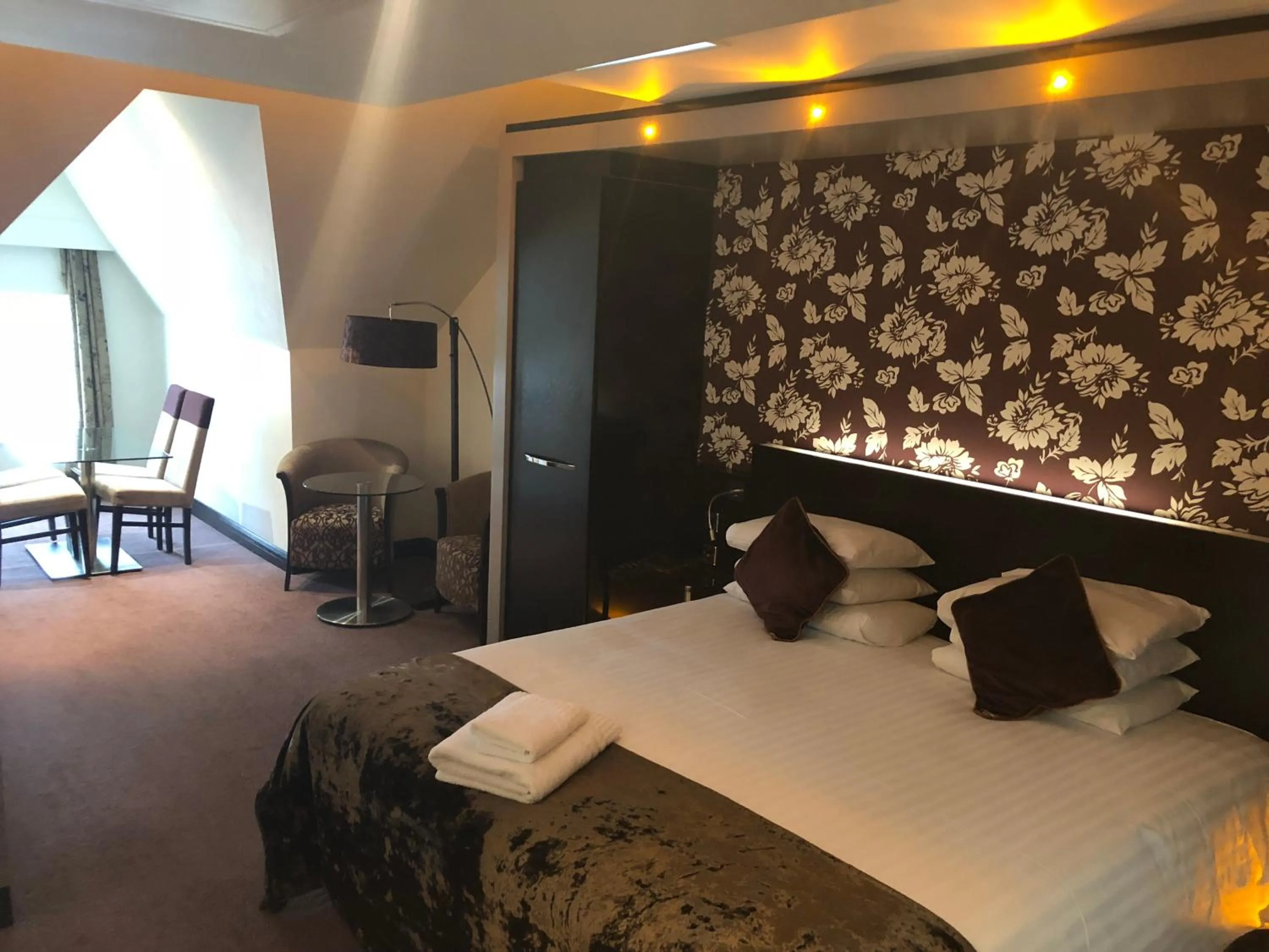 Bed in The BlueBell Hotel