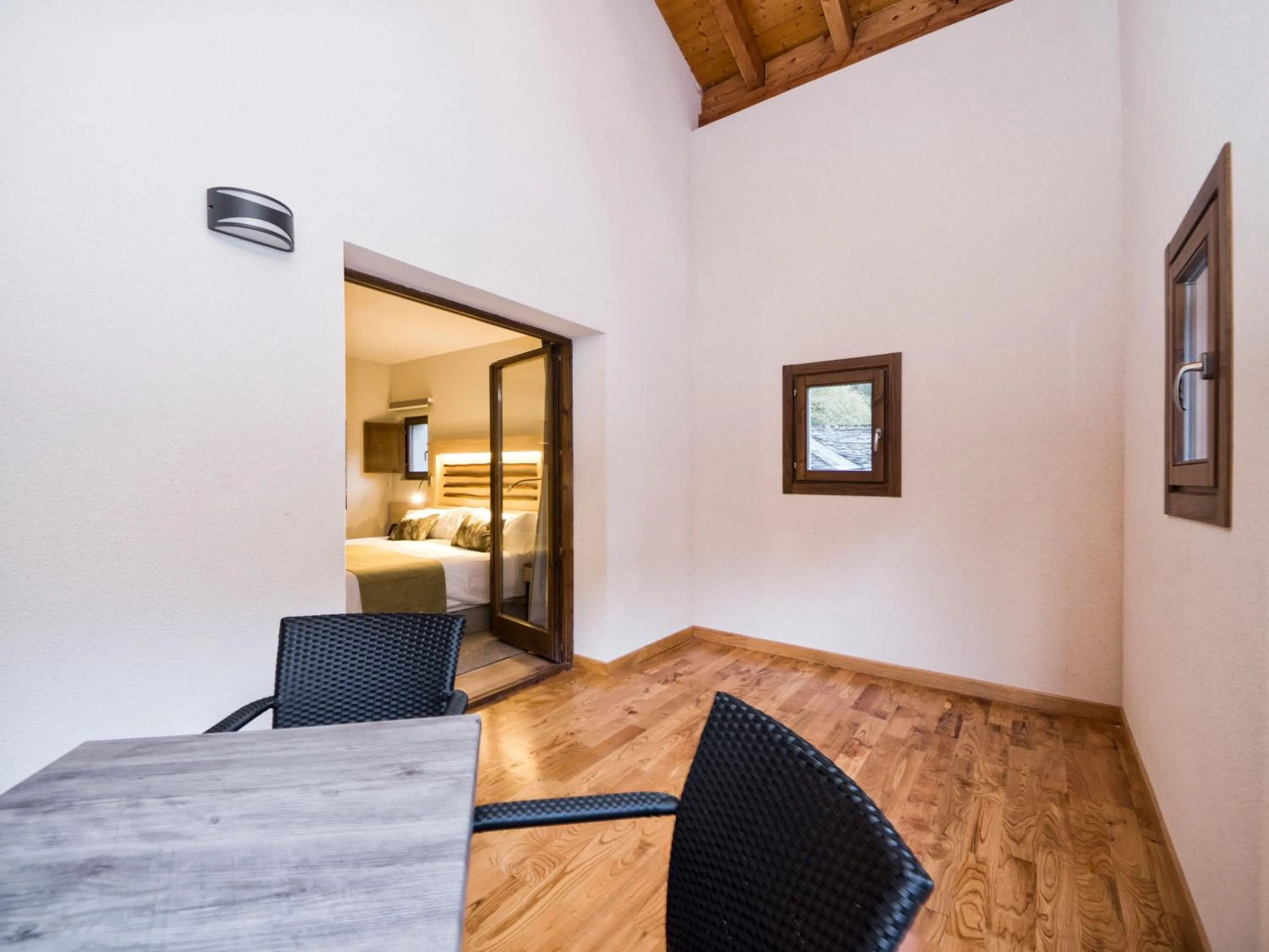 Balcony/Terrace, Bed in Hotel Rural Las Montañas de Pumar