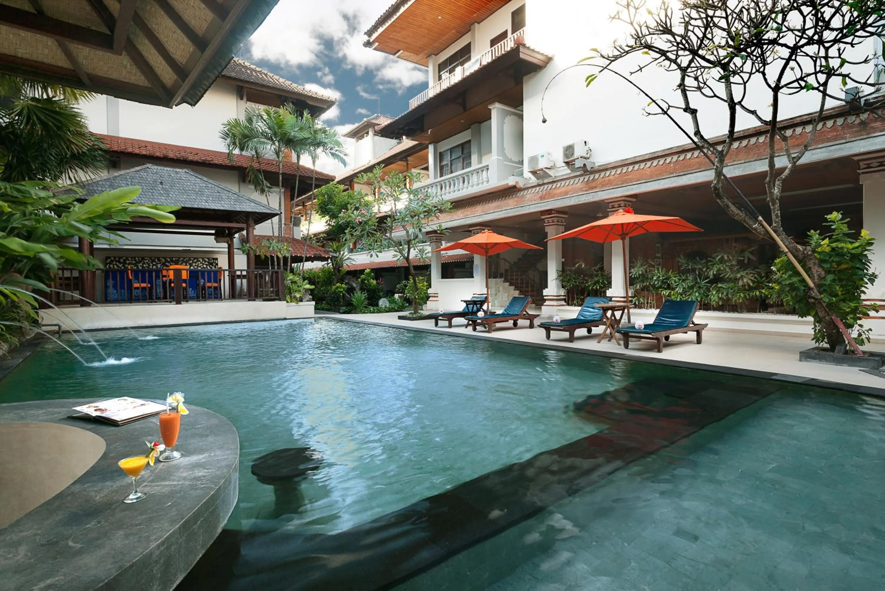 Swimming pool in Bali Summer Hotel by Amerta