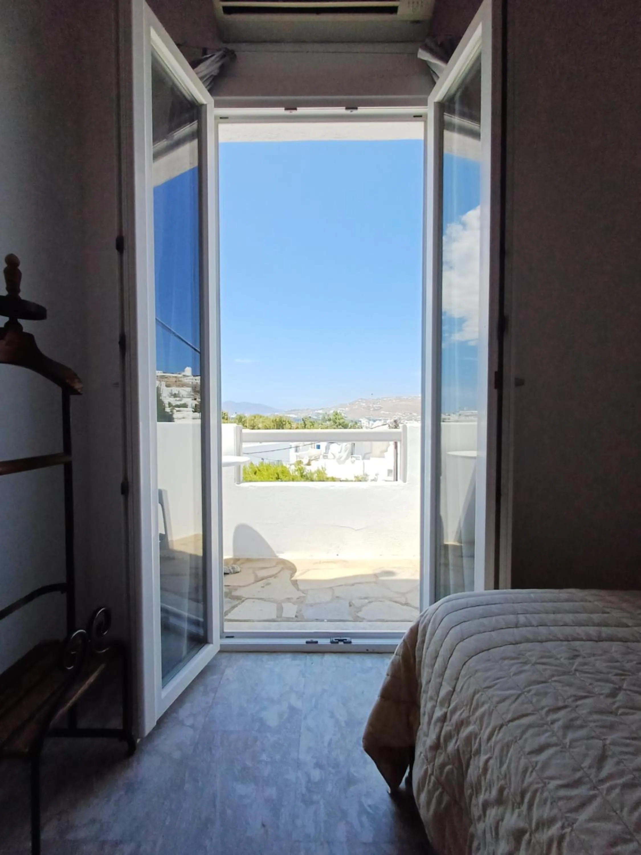 View (from property/room), Bed in Manos Rooms