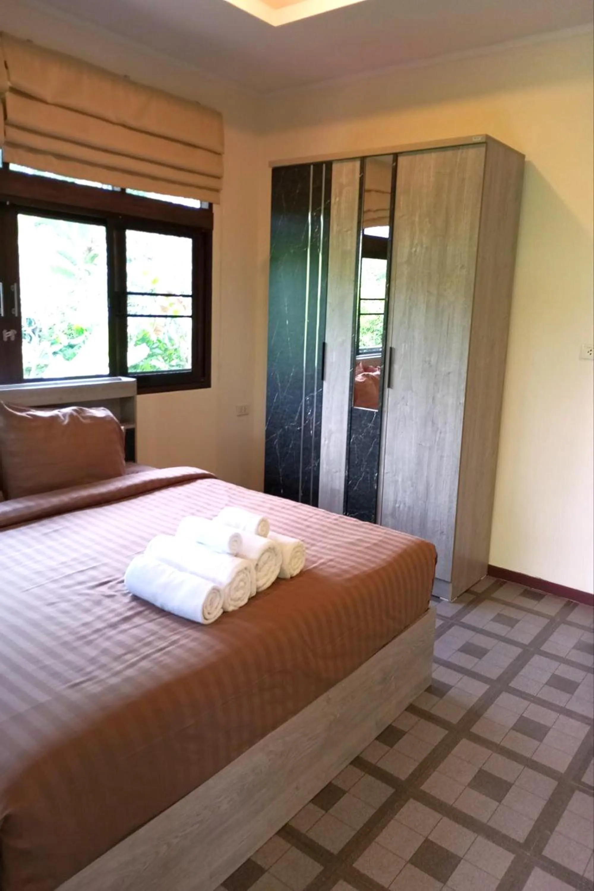 Bed in Baan Chai Thung Resort