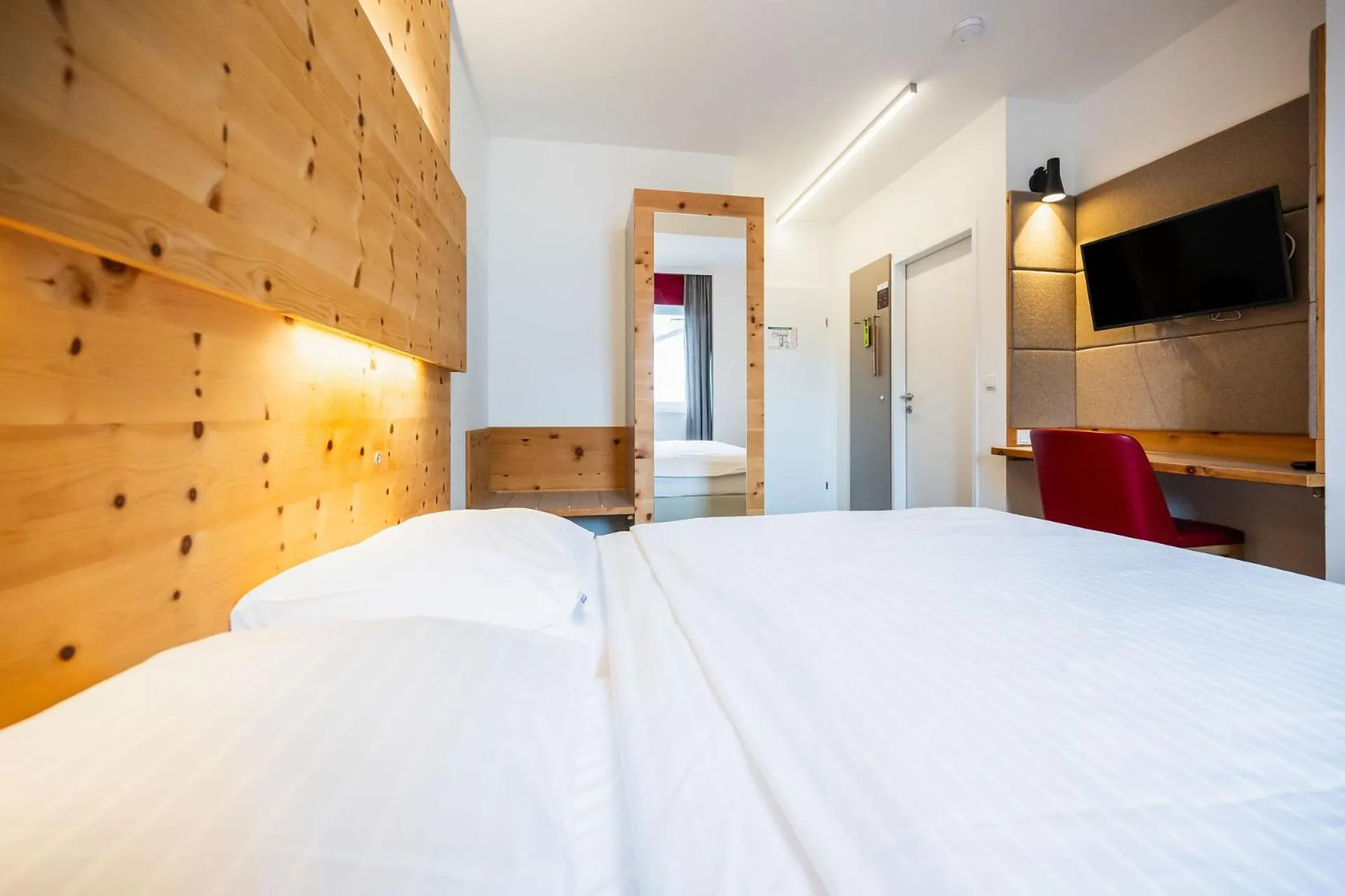 Bed in Motel Zeltweg - Self-Check-in