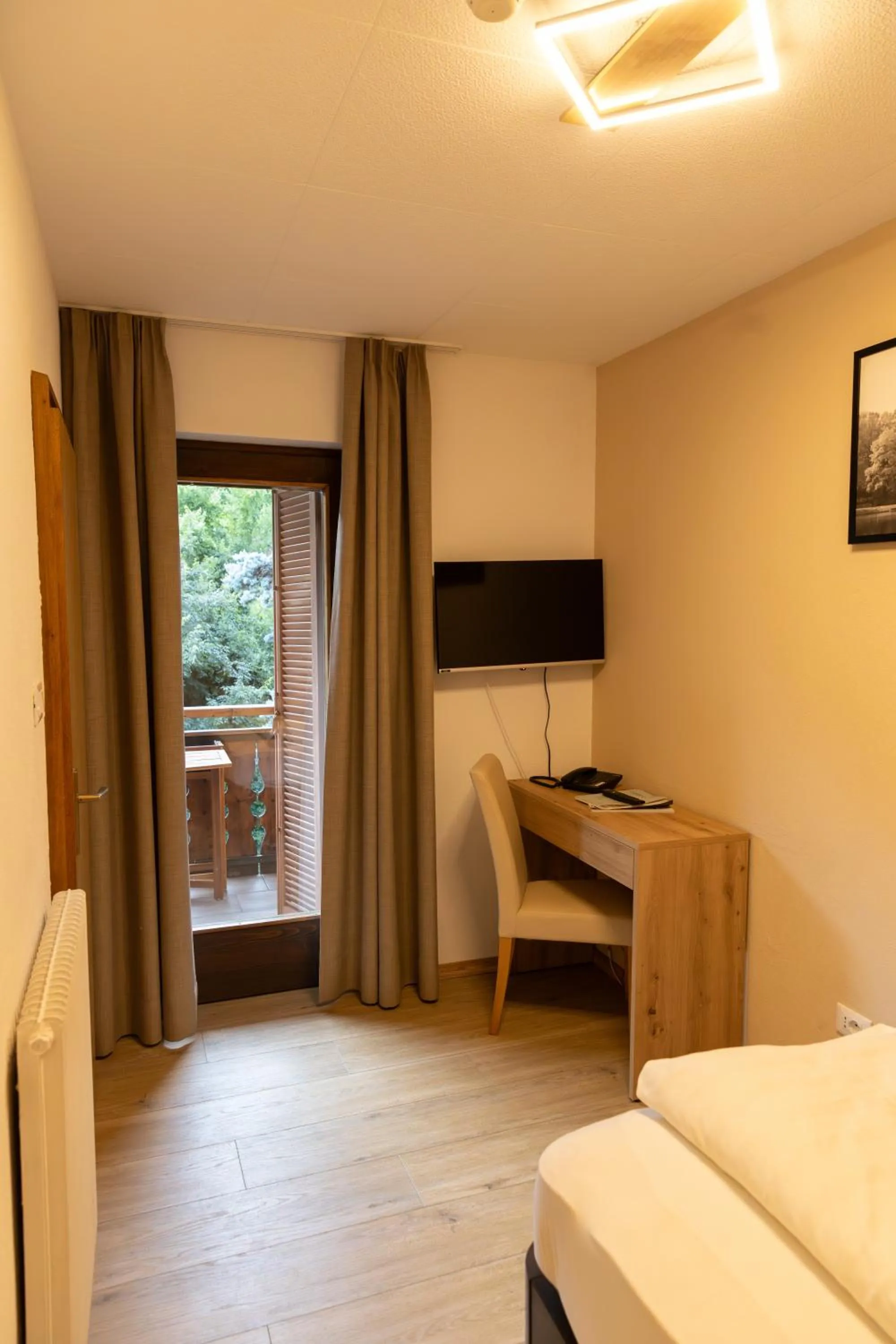 Bed in Hotel Marlingerhof