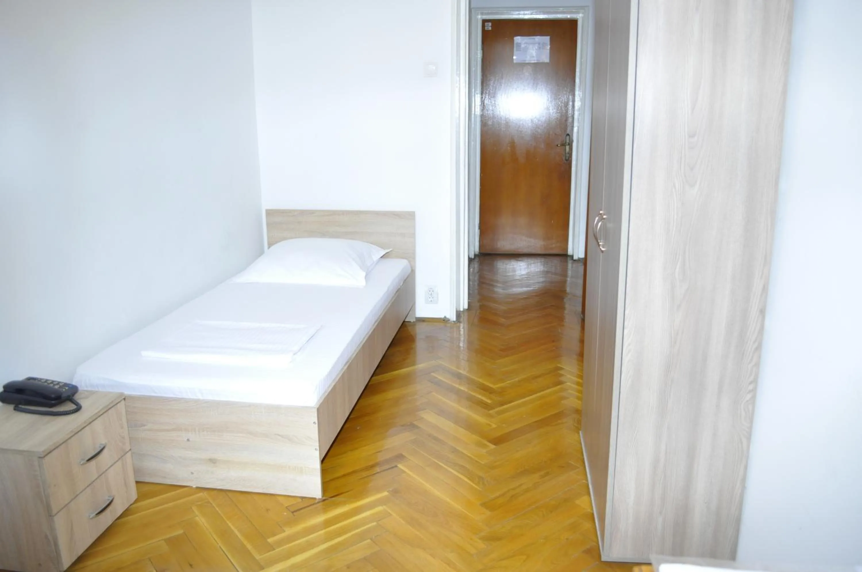 Photo of the whole room, Bed in Hotel Triumf