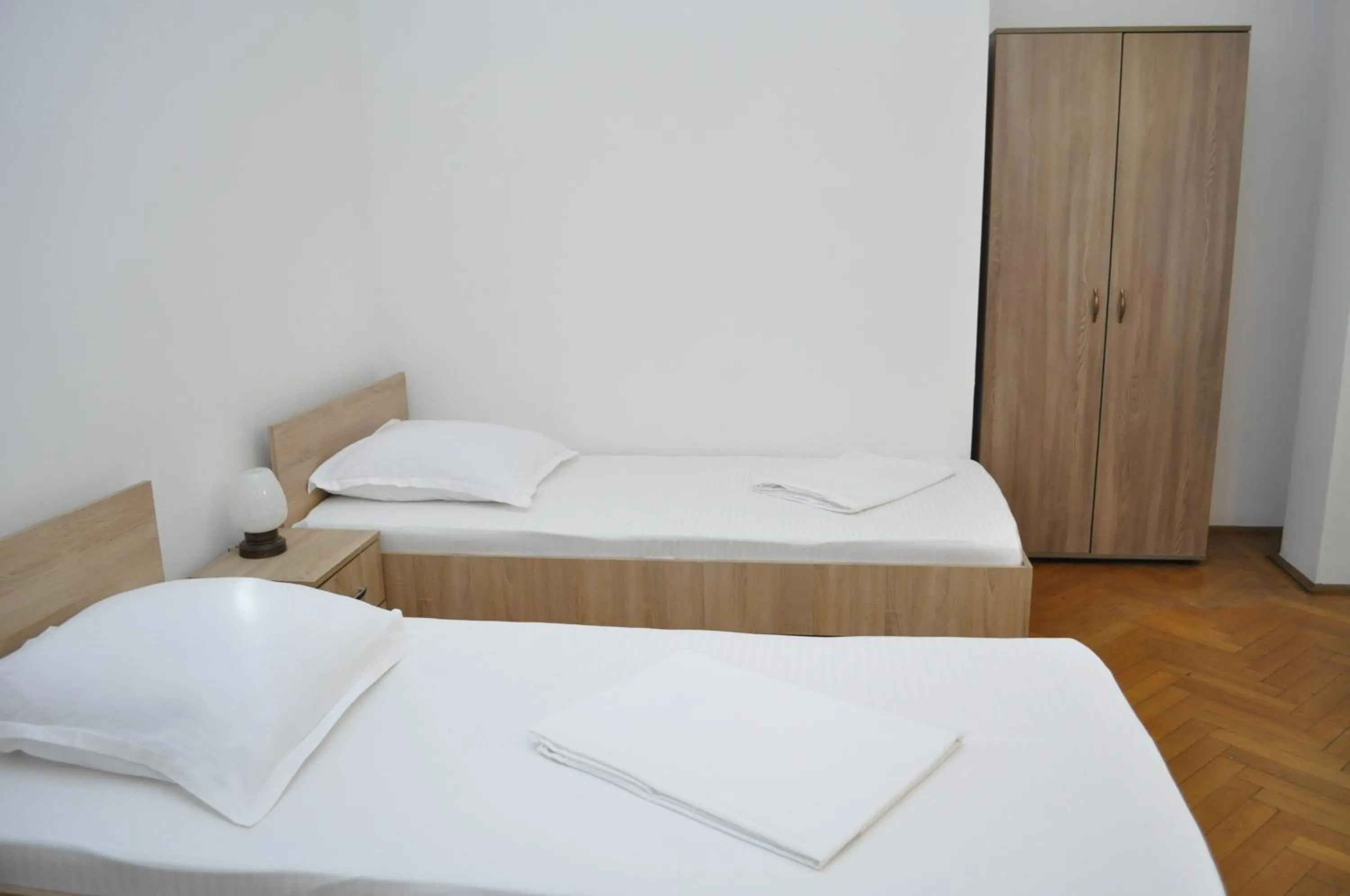 Photo of the whole room, Bed in Hotel Triumf