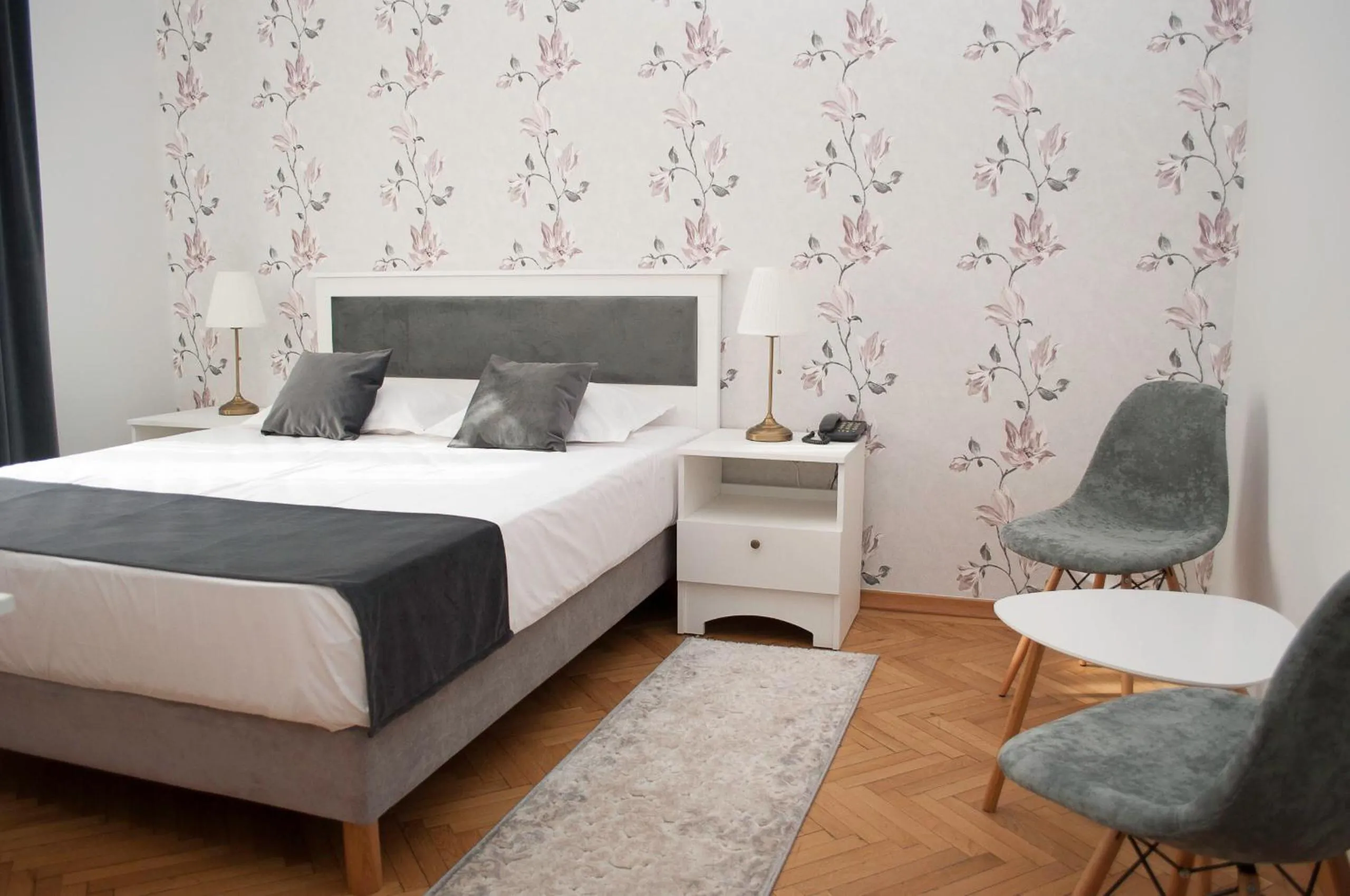 Photo of the whole room, Bed in Hotel Triumf