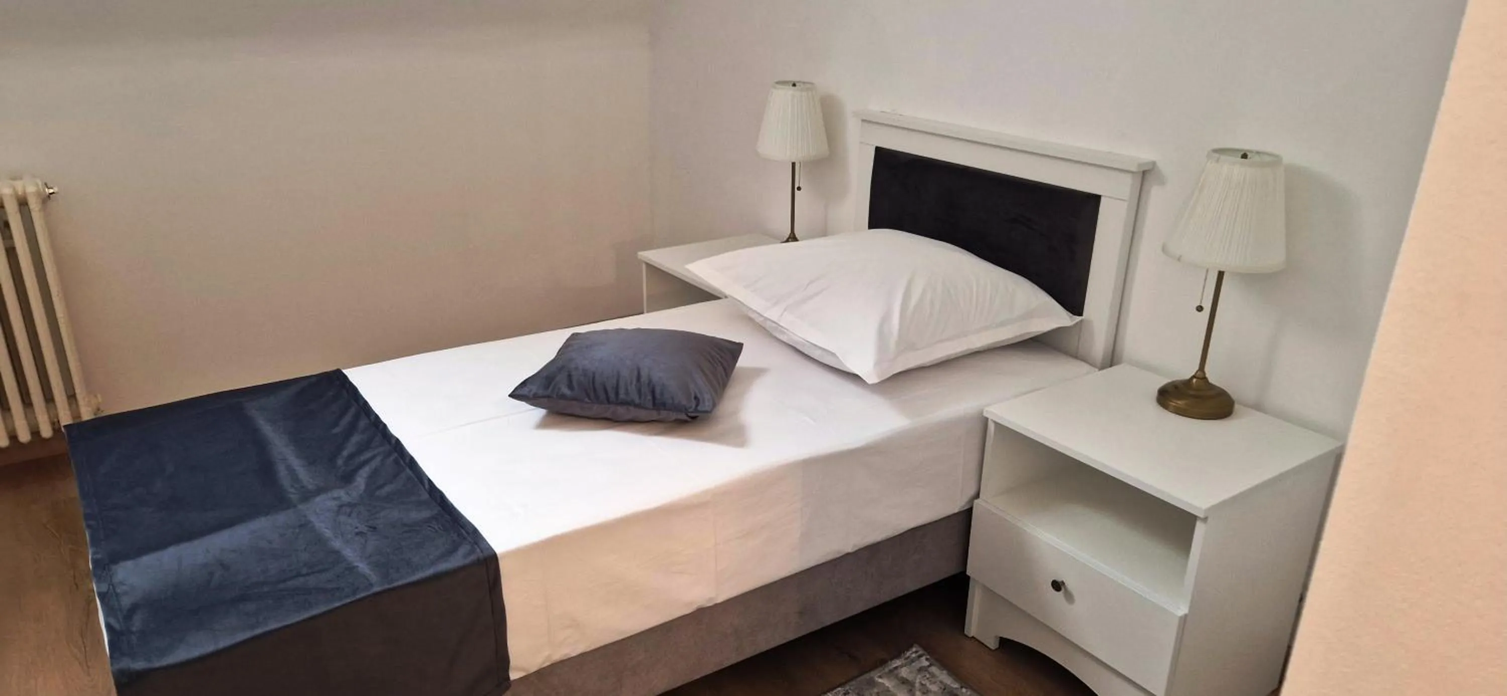 Bed in Hotel Triumf