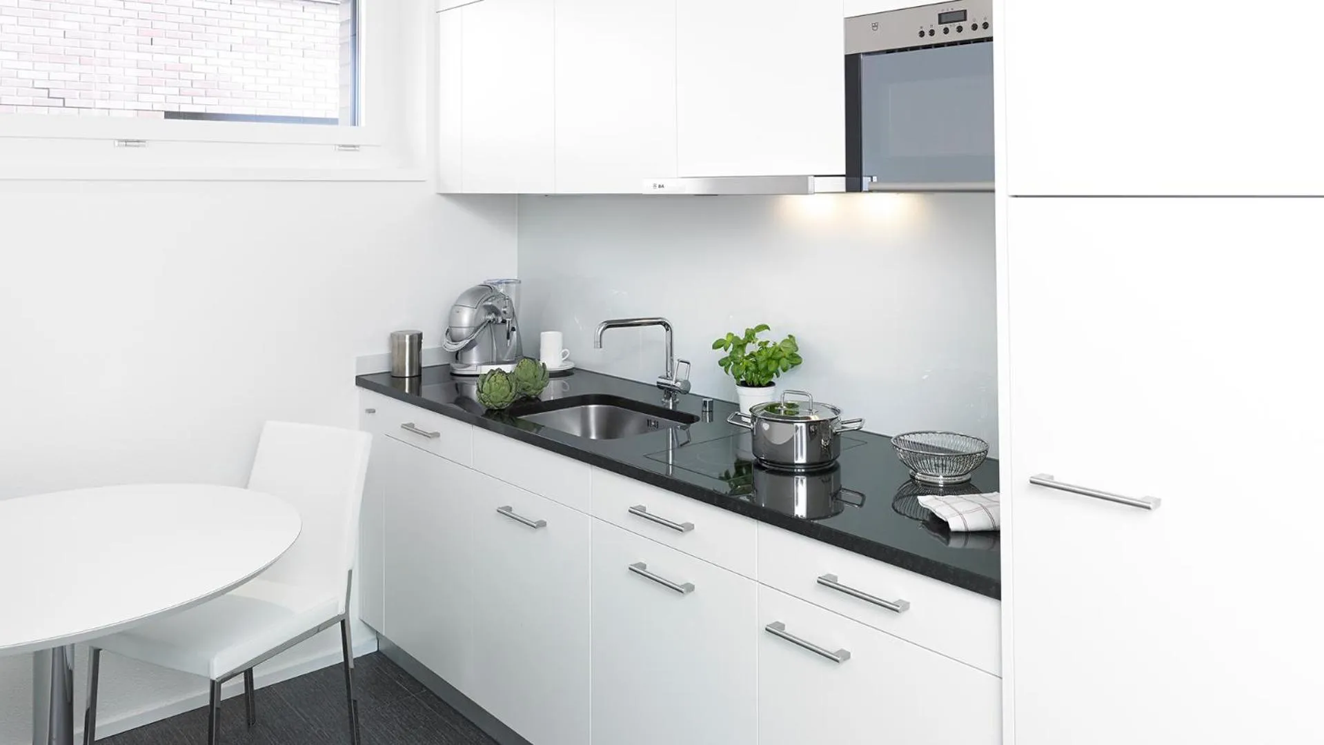 Kitchen or kitchenette in City Apartments
