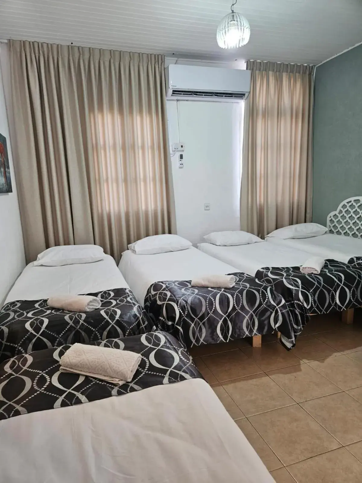 Quintuple Room (5 Adults) in Atara Hotel Quintuple Room (5 Adults) in Atara Hotel