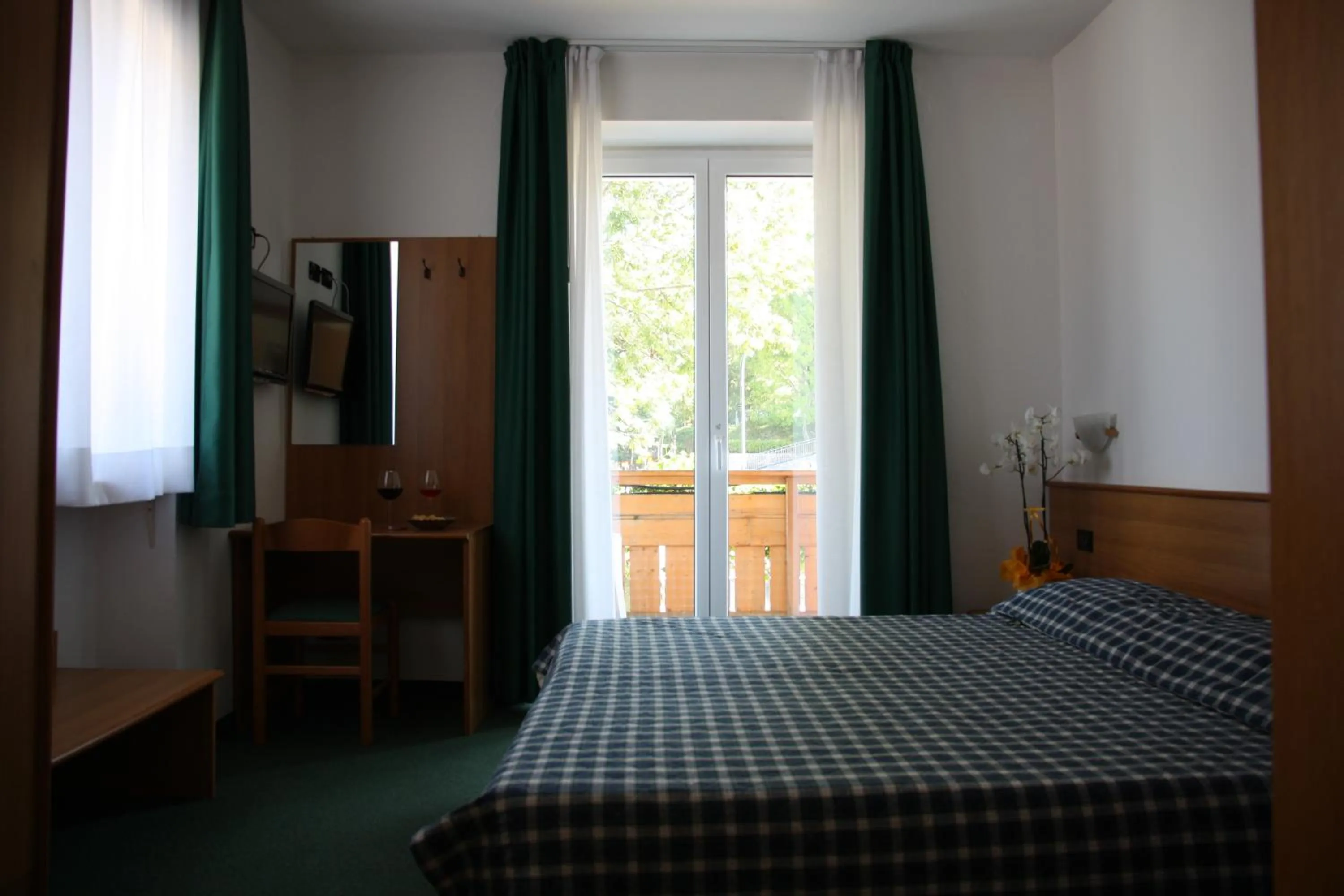 Bed in Albergo Miramonti