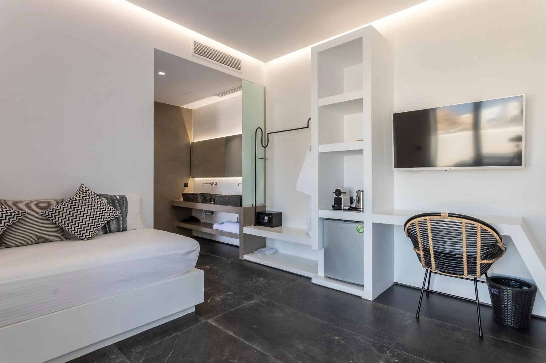 Seating area, Bed in Aegean Gem