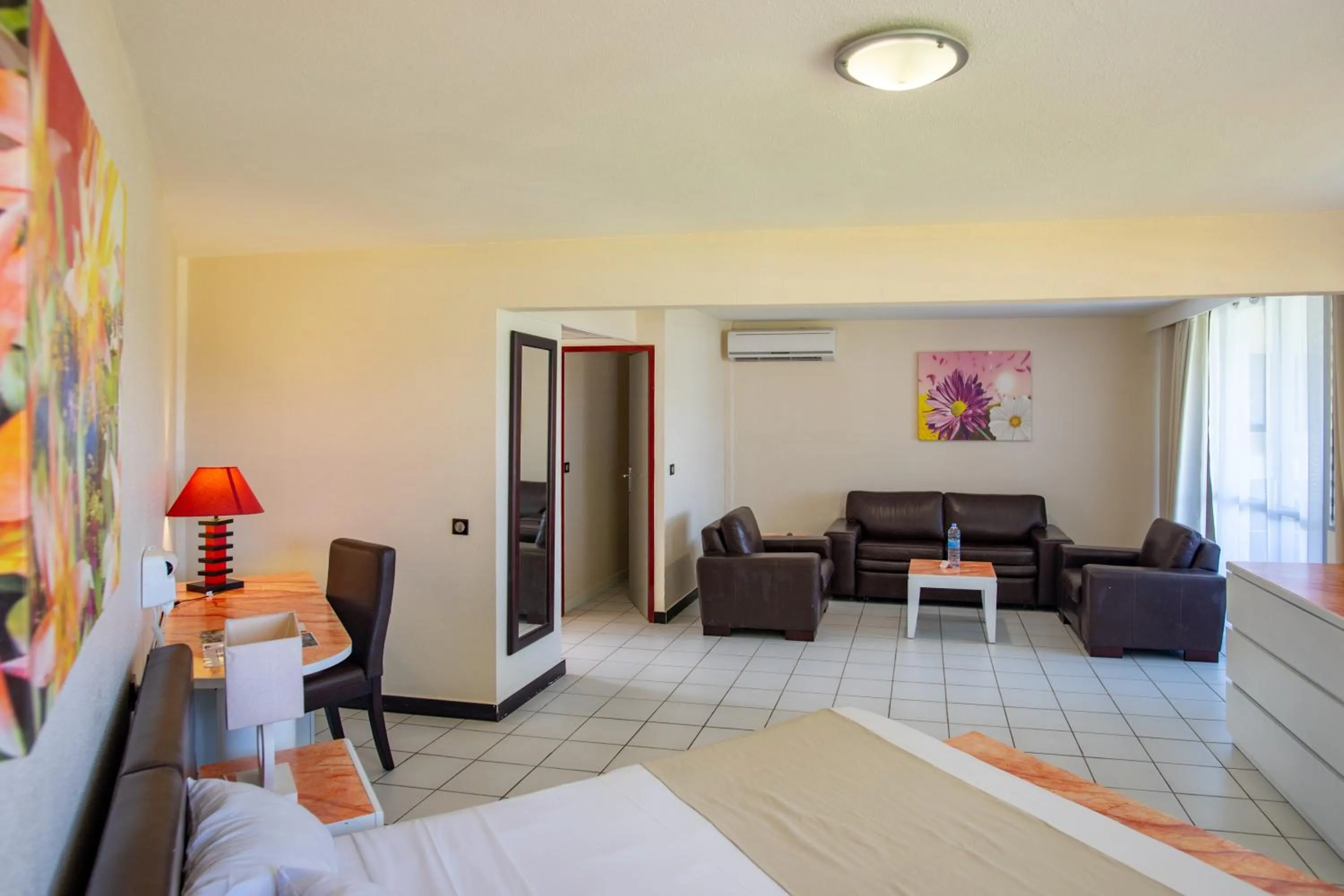 Seating area, Bed in Canella Beach Hotel