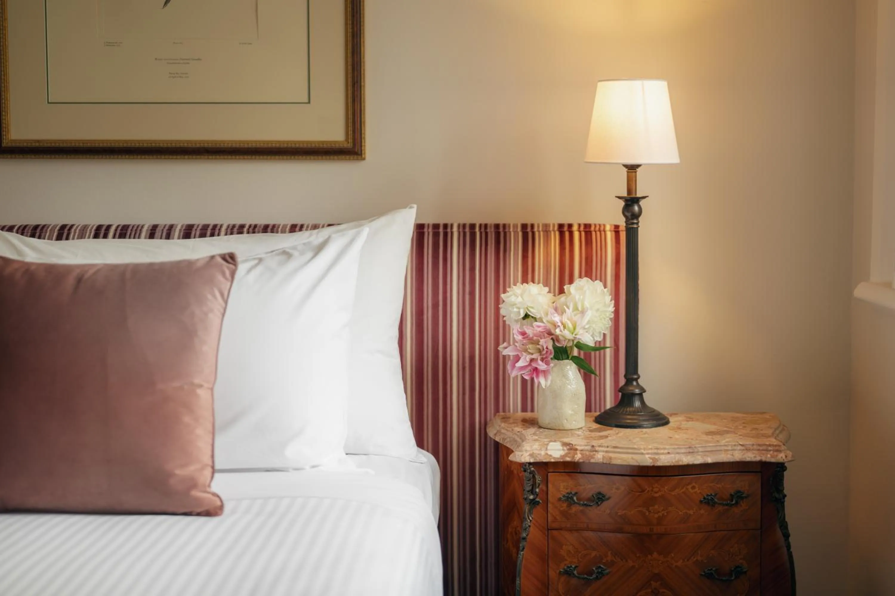 Bed in The Russell Boutique Hotel