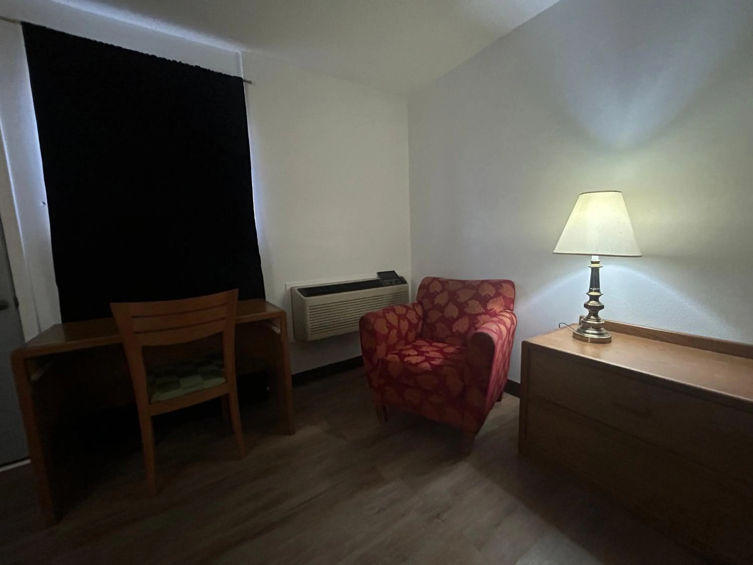 Seating area in Candlelight Inn by Capital O Scottsbluff