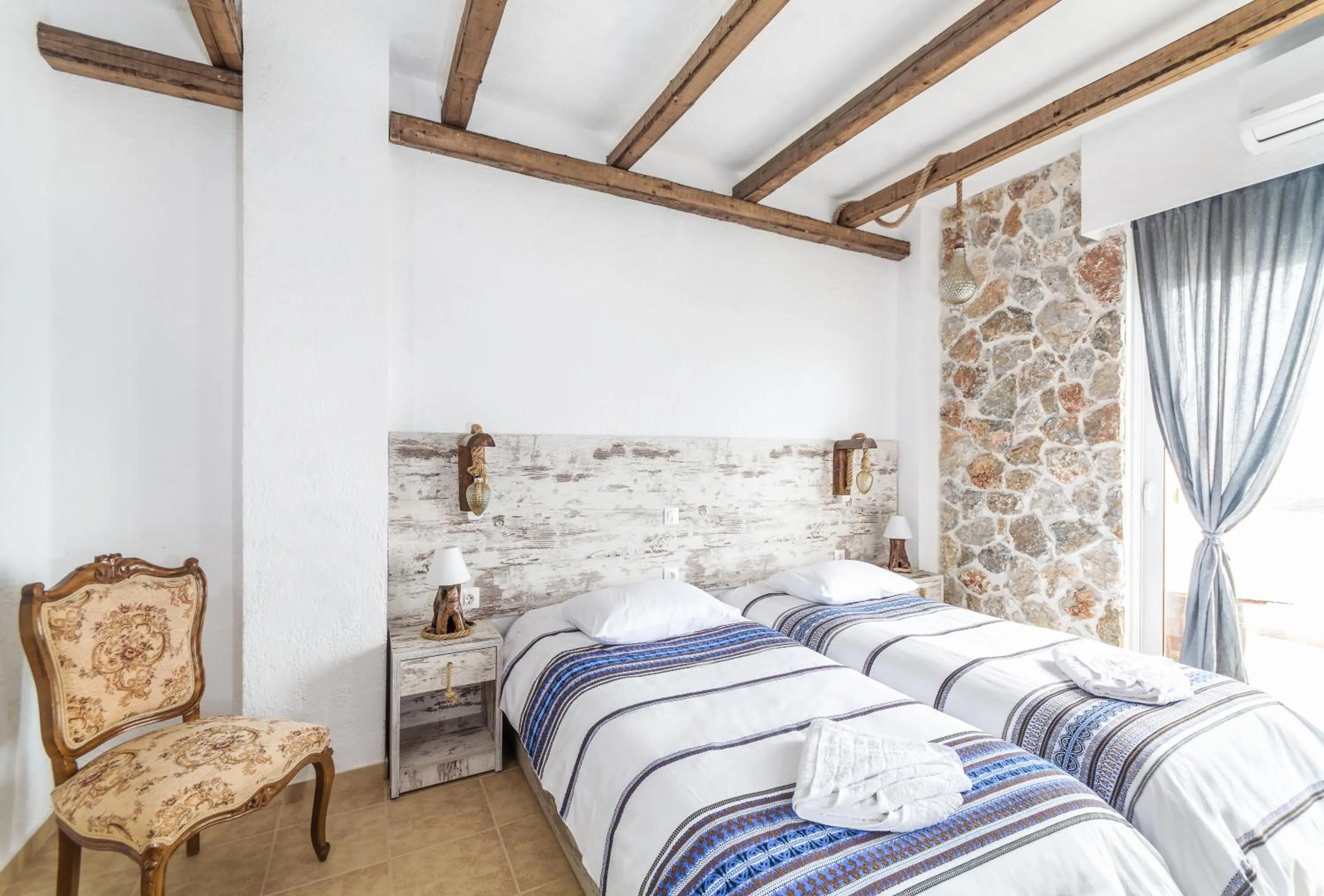 Bed in Limeri Traditional Guest House