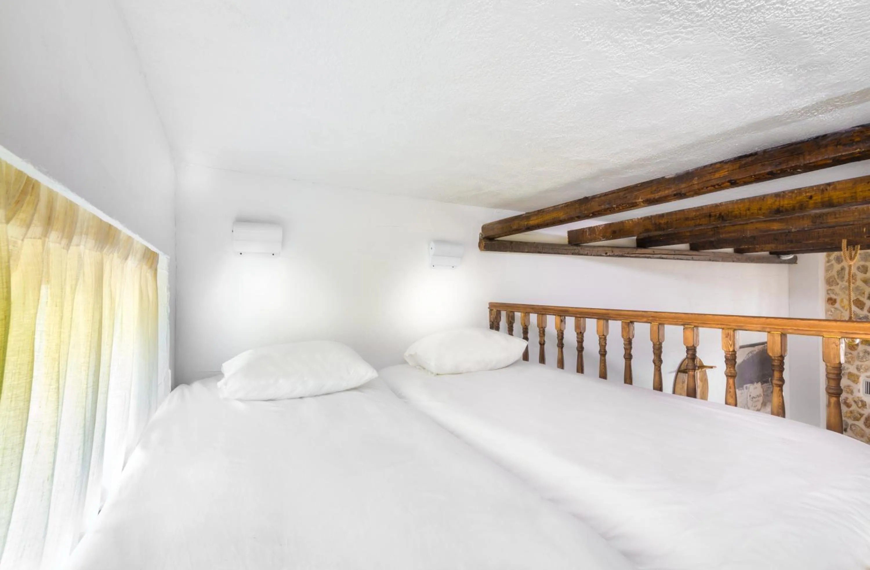 Bed in Limeri Traditional Guest House