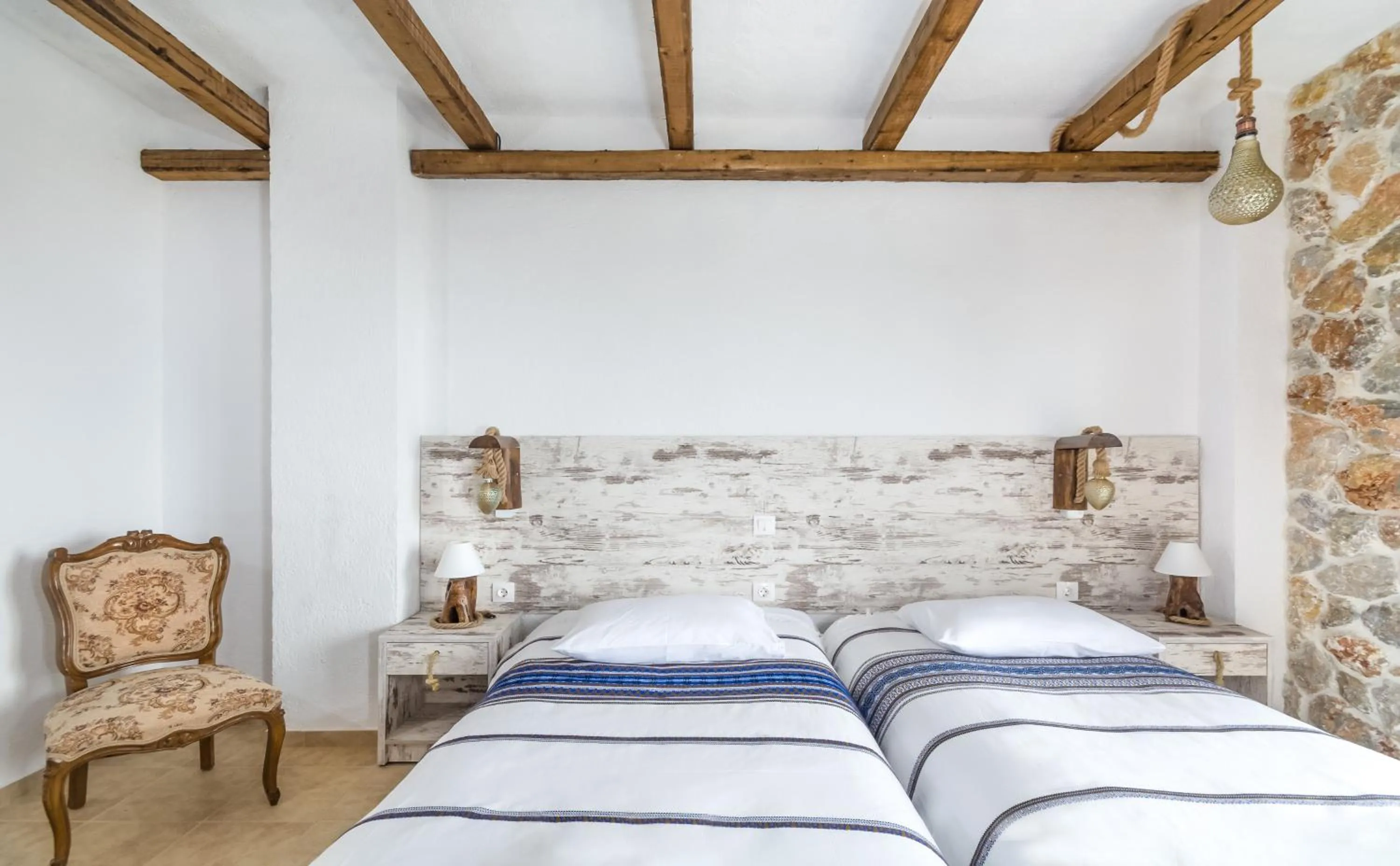 Bed in Limeri Traditional Guest House