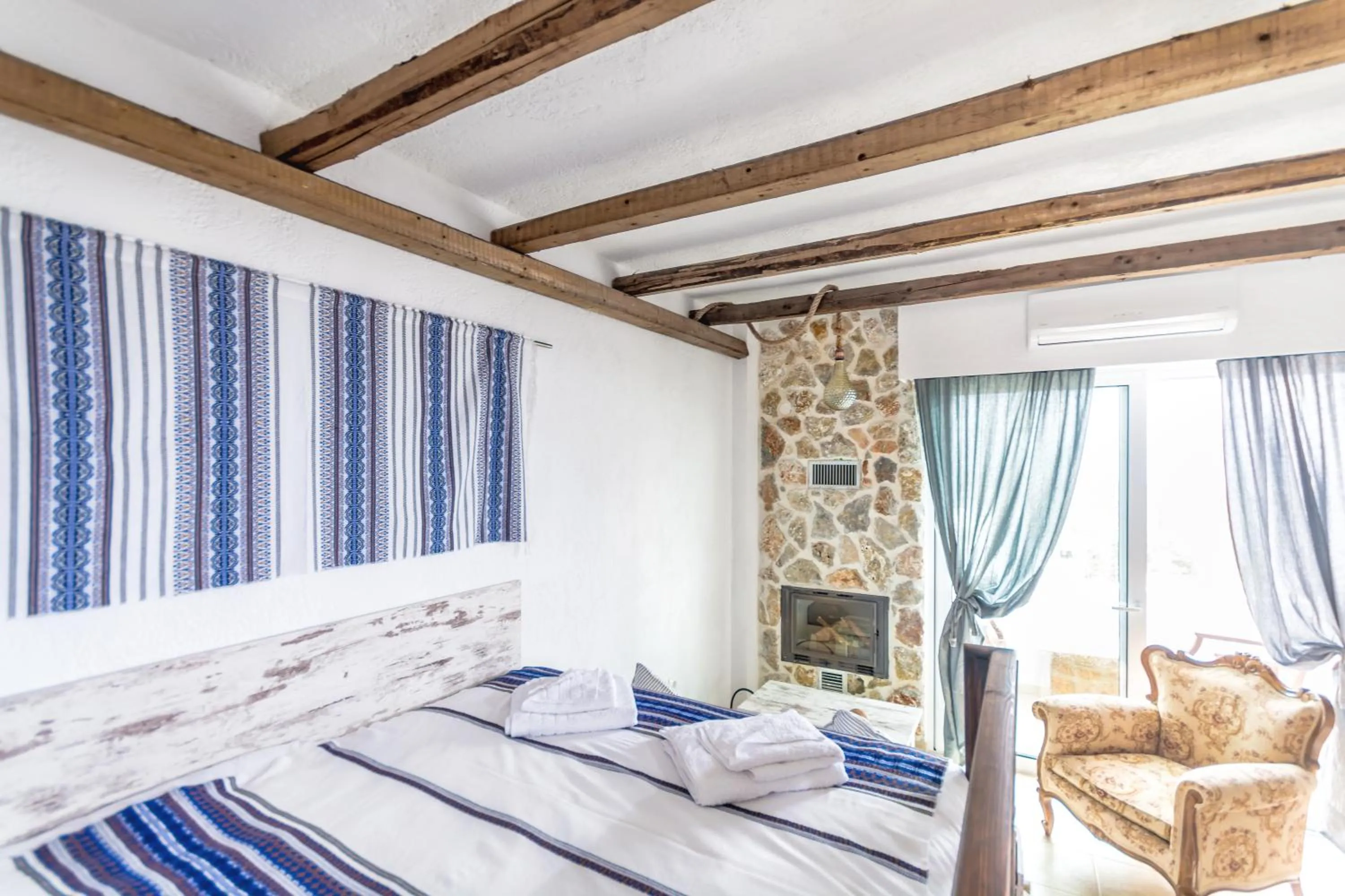 Bed in Limeri Traditional Guest House