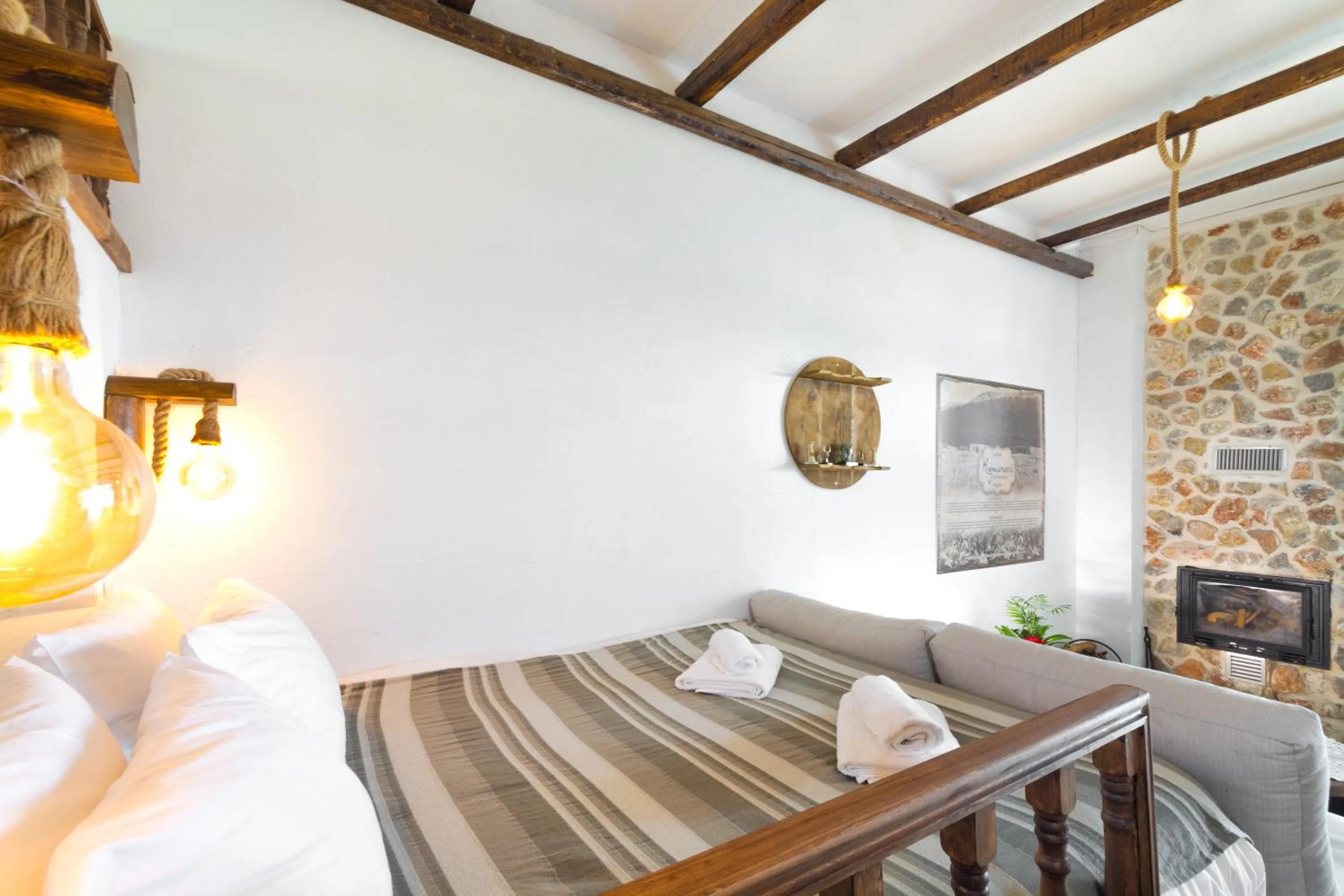 Bed in Limeri Traditional Guest House