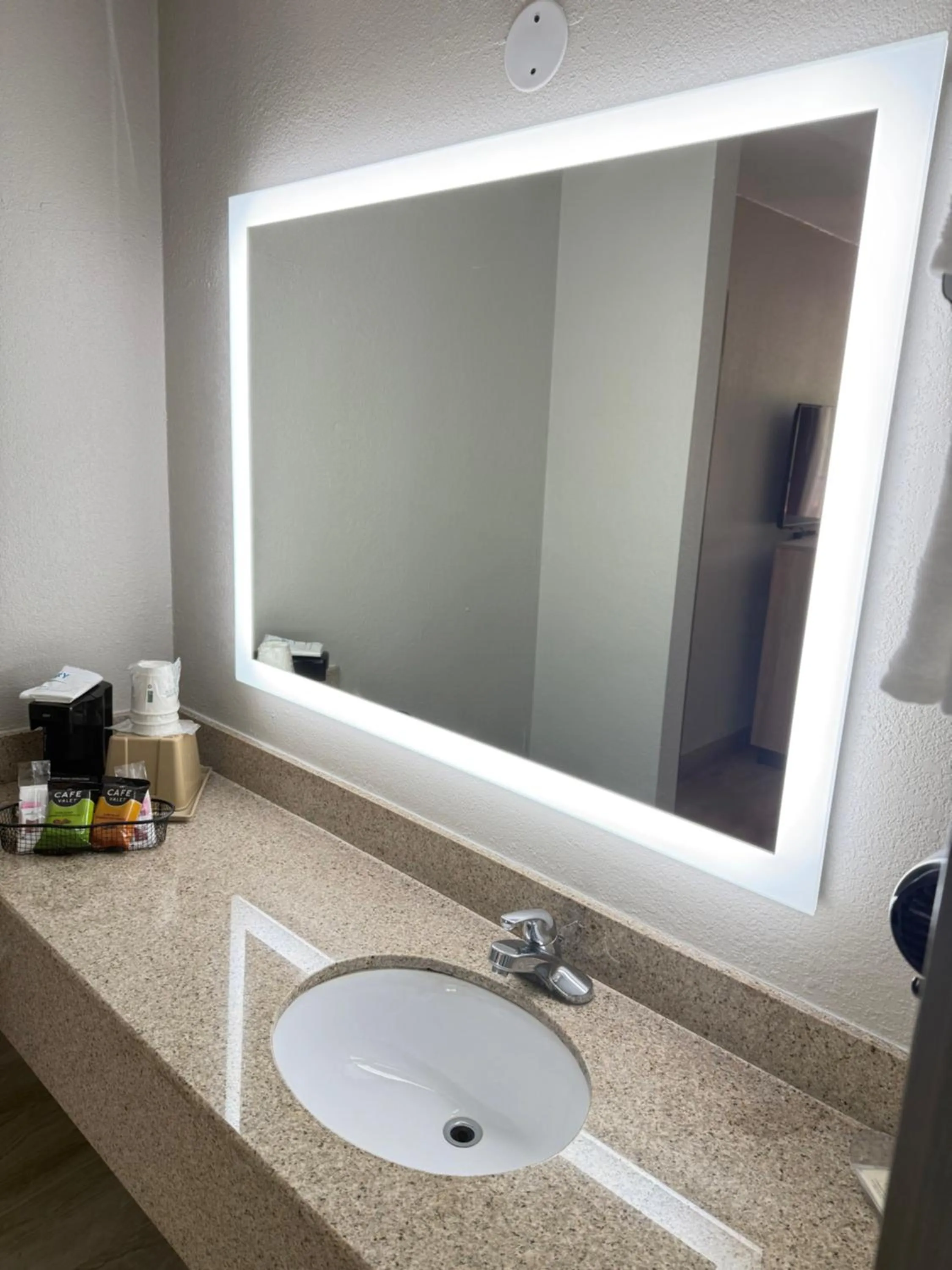 Bathroom in Days Inn by Wyndham Shorter