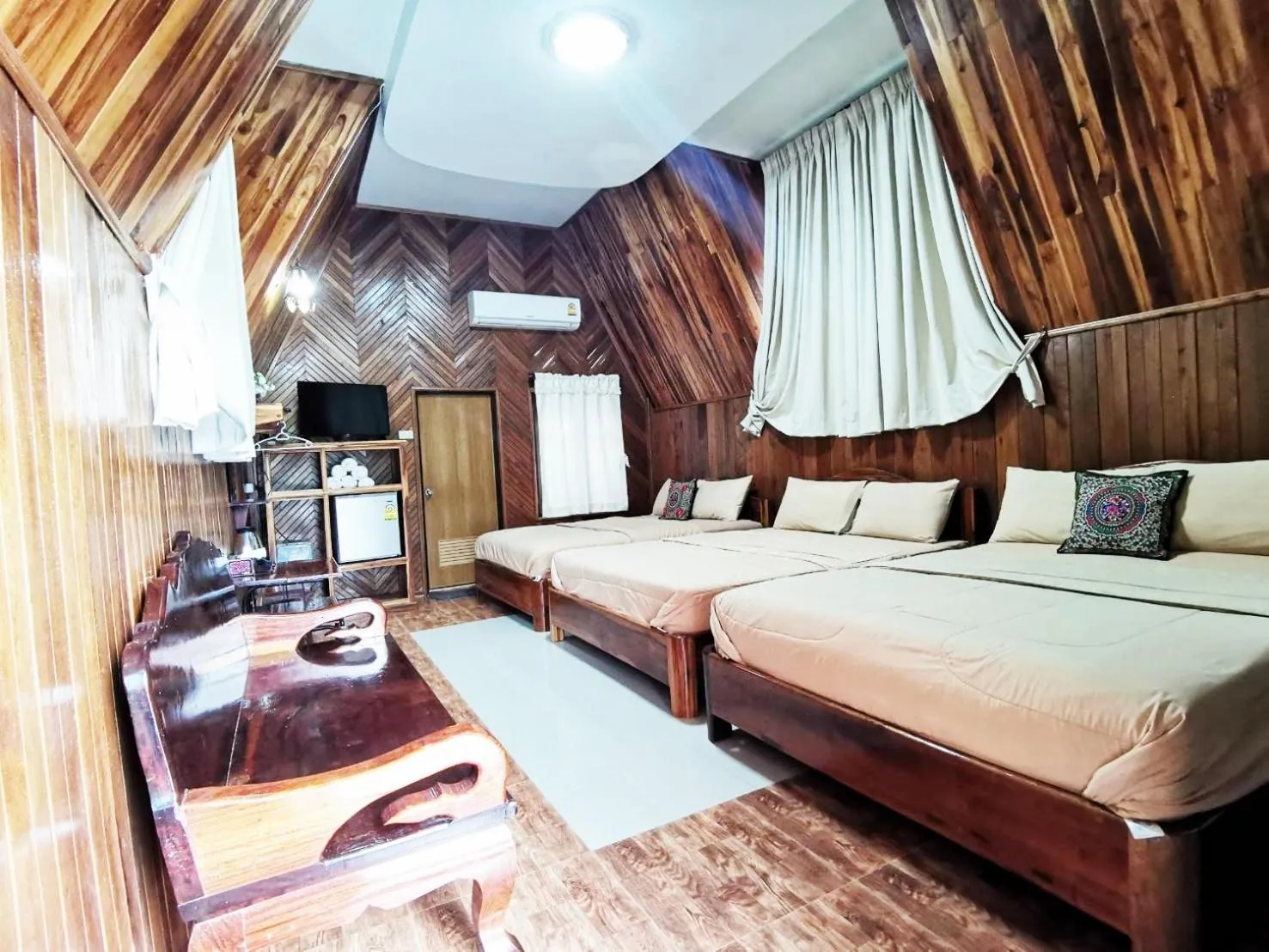 Bed in Bansuanphuhong Resort