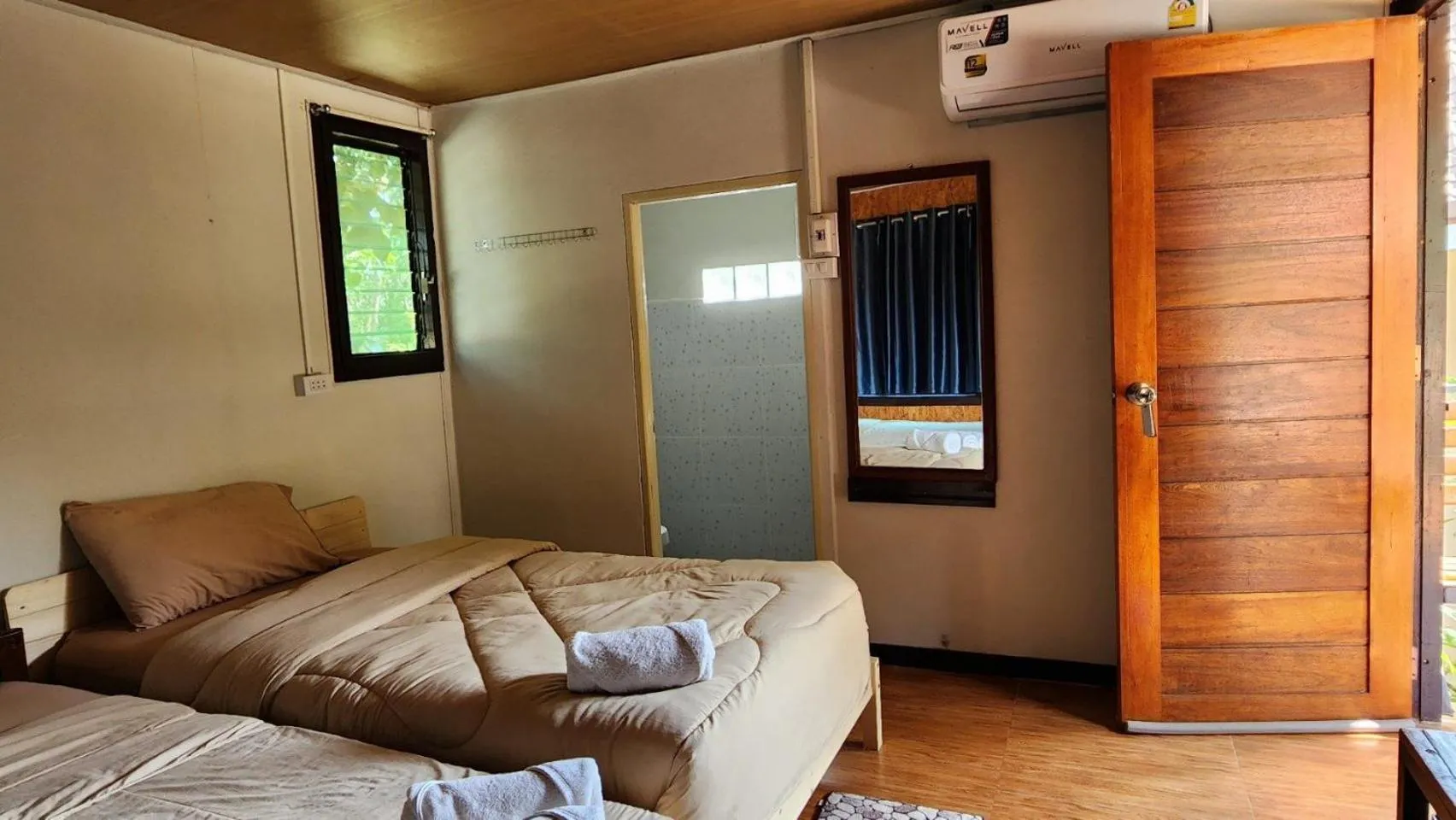 Bed in Bansuanphuhong Resort