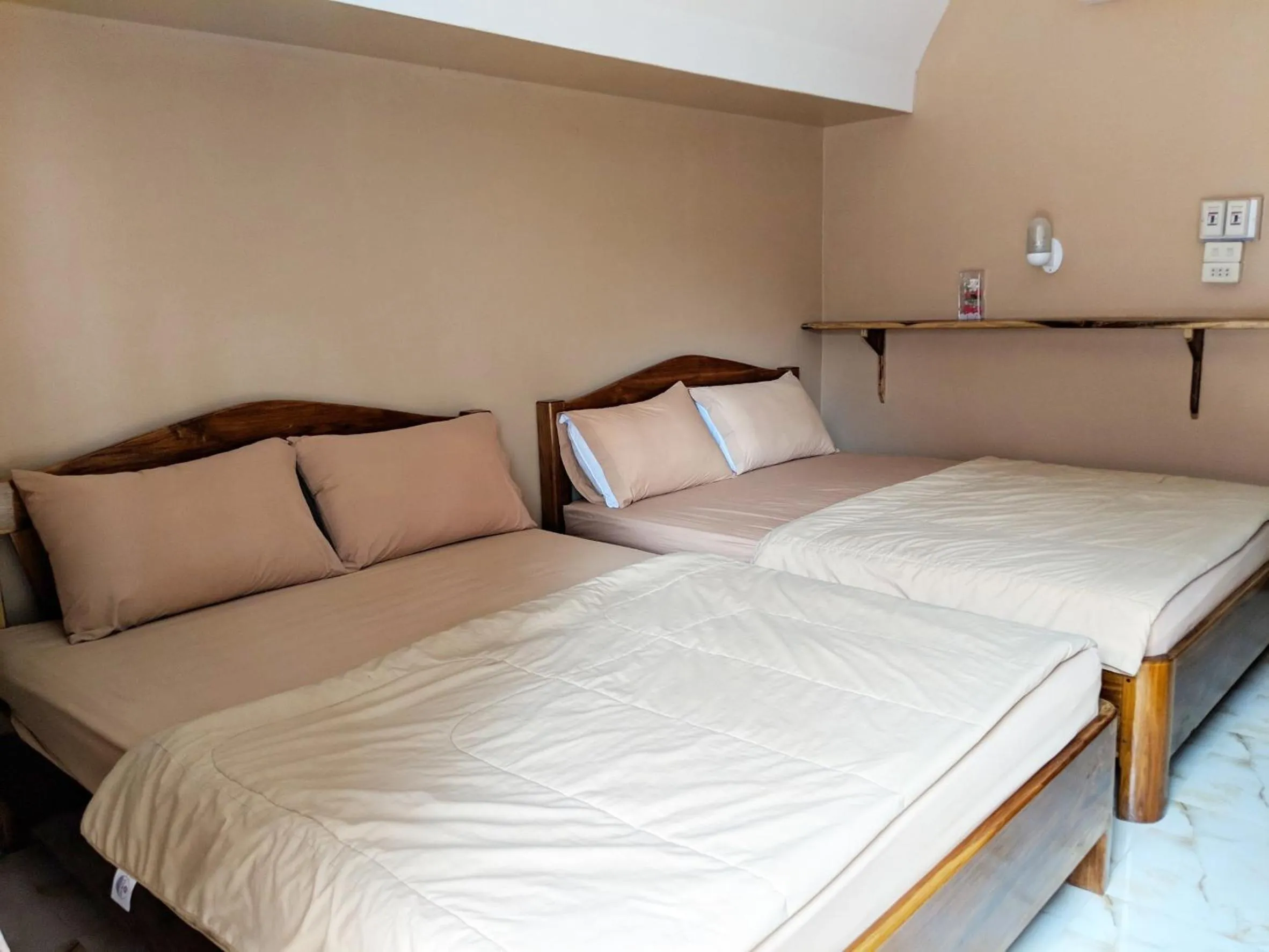 Bed in Bansuanphuhong Resort