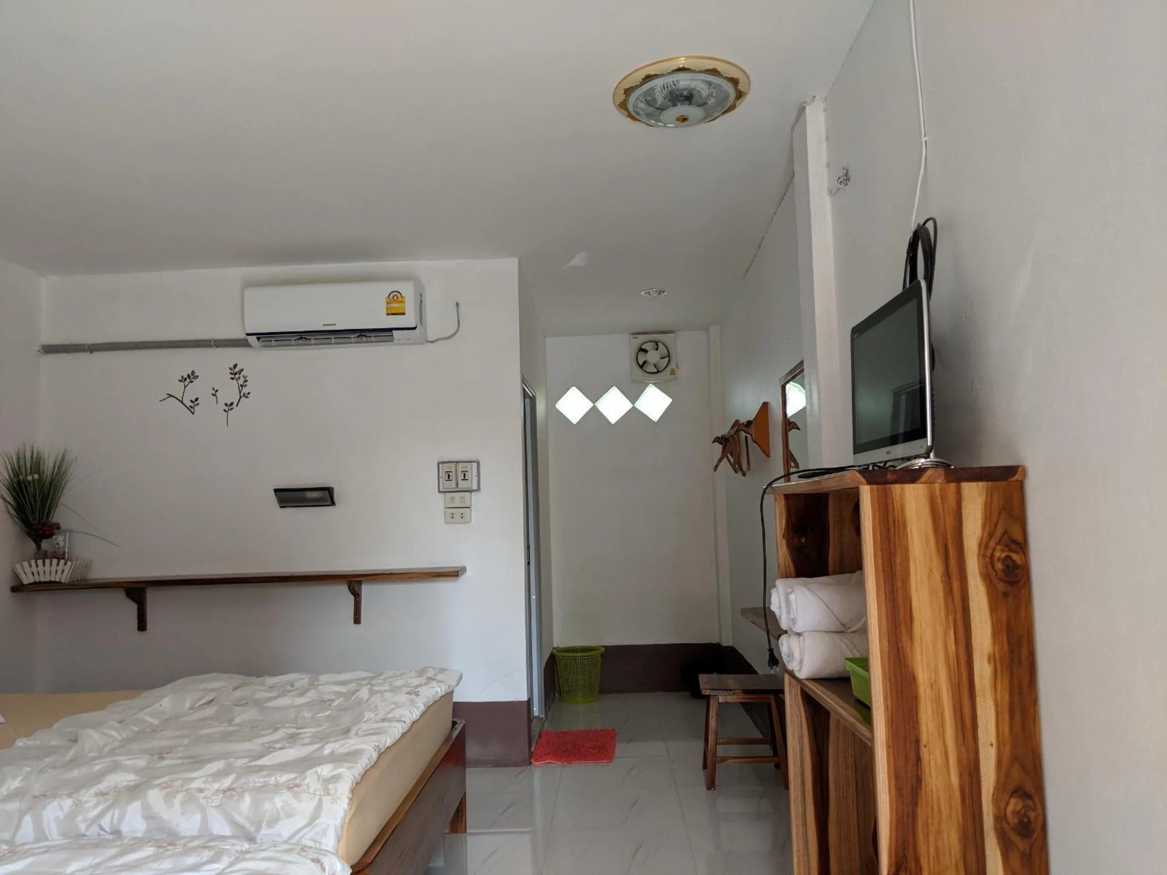 Bed in Bansuanphuhong Resort