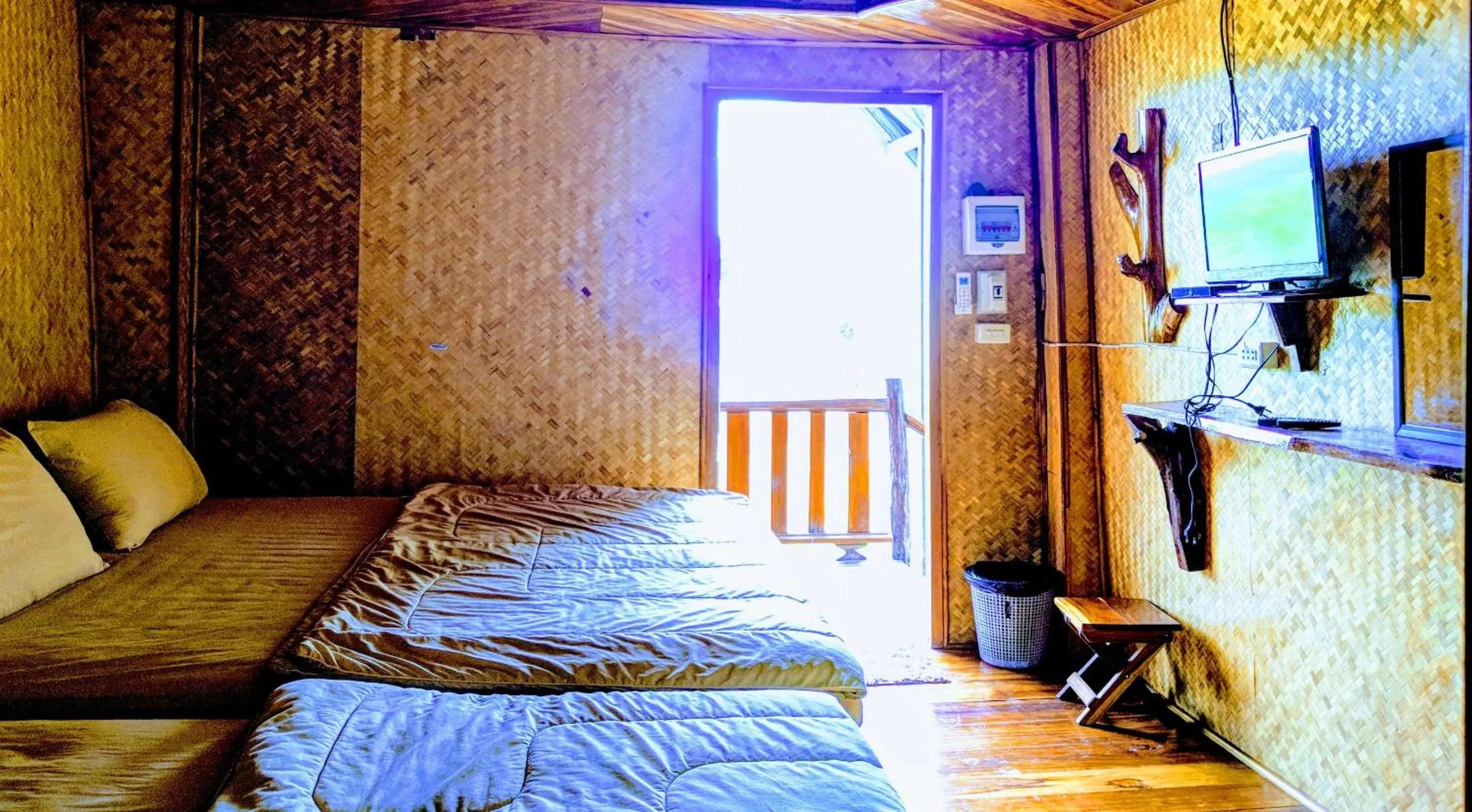 Bed in Bansuanphuhong Resort