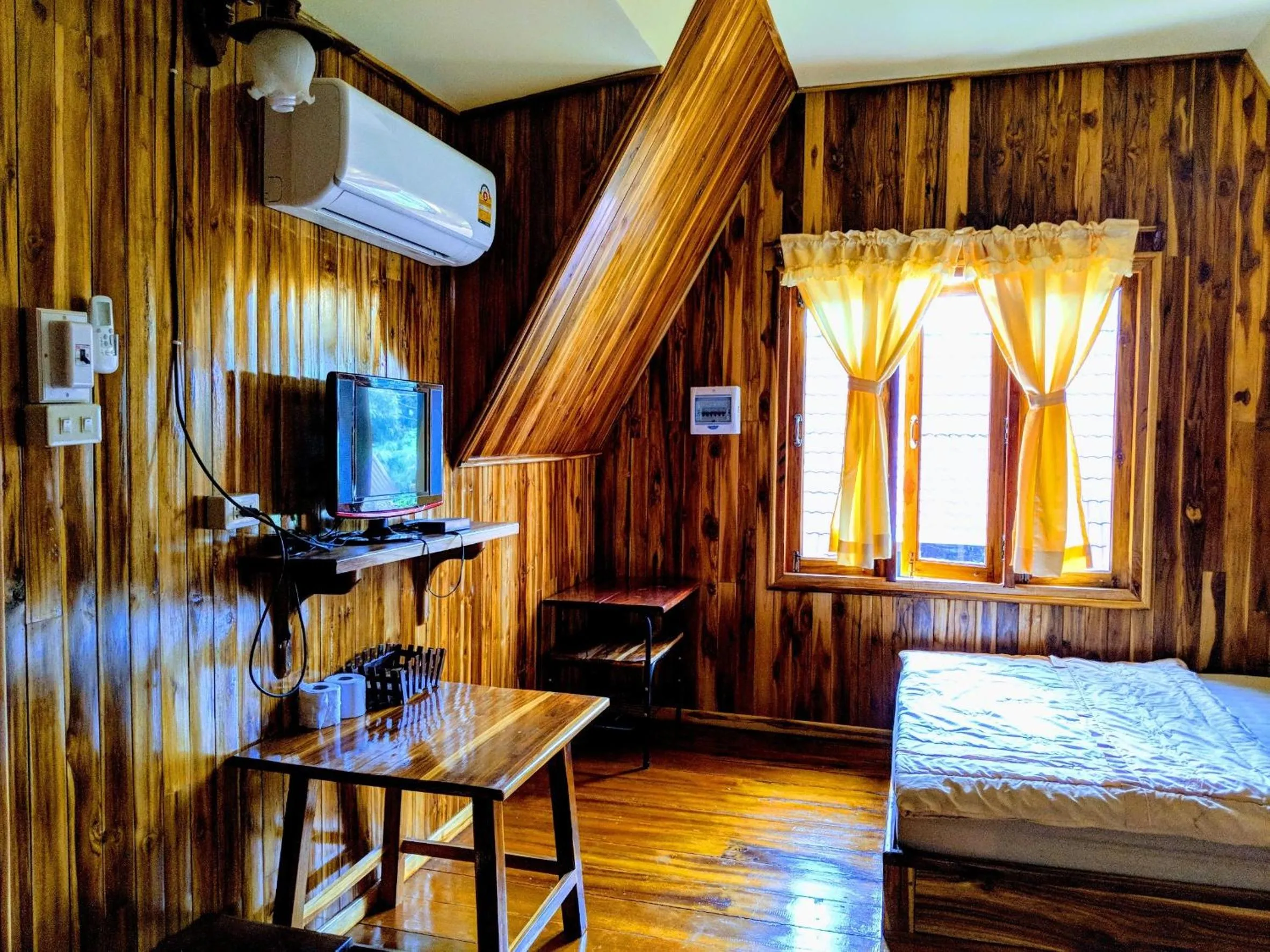 Bed in Bansuanphuhong Resort