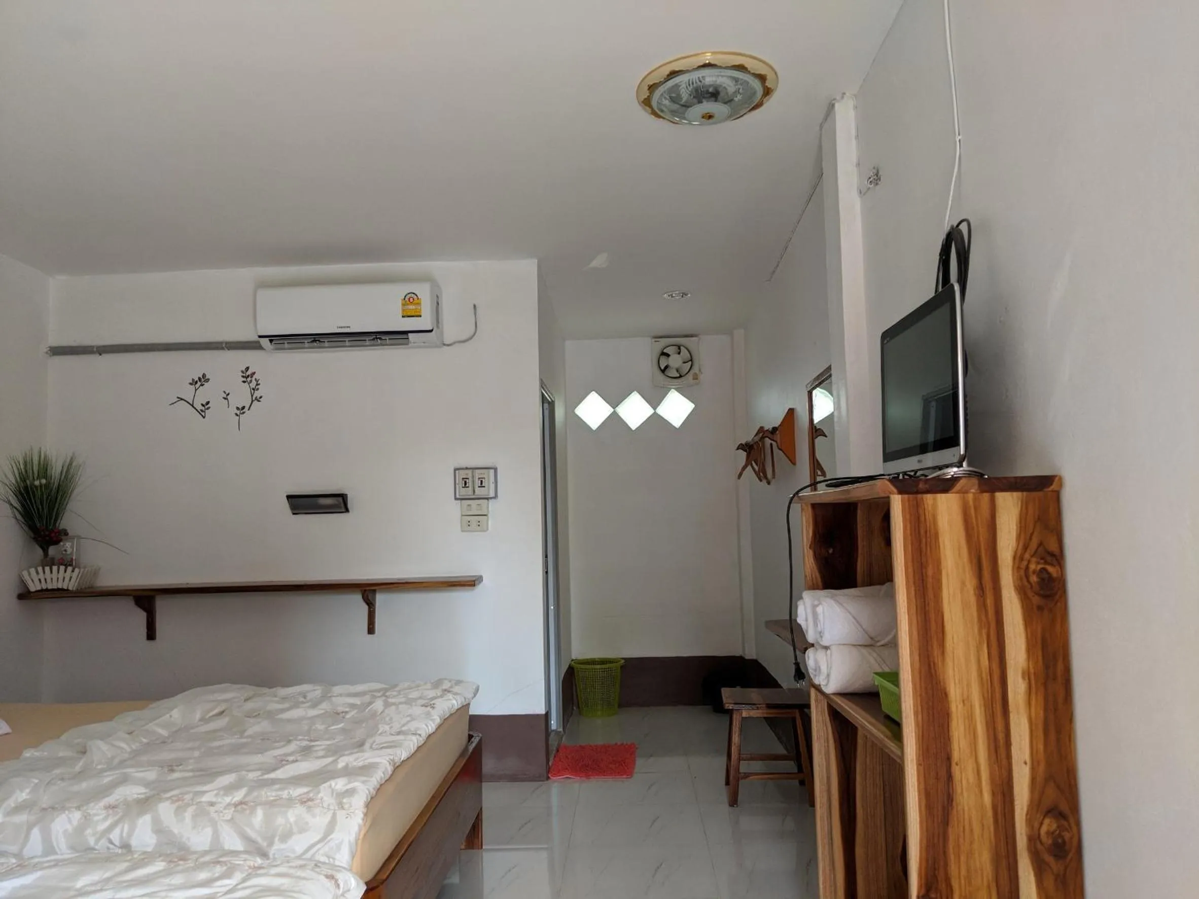 Bed in Bansuanphuhong Resort