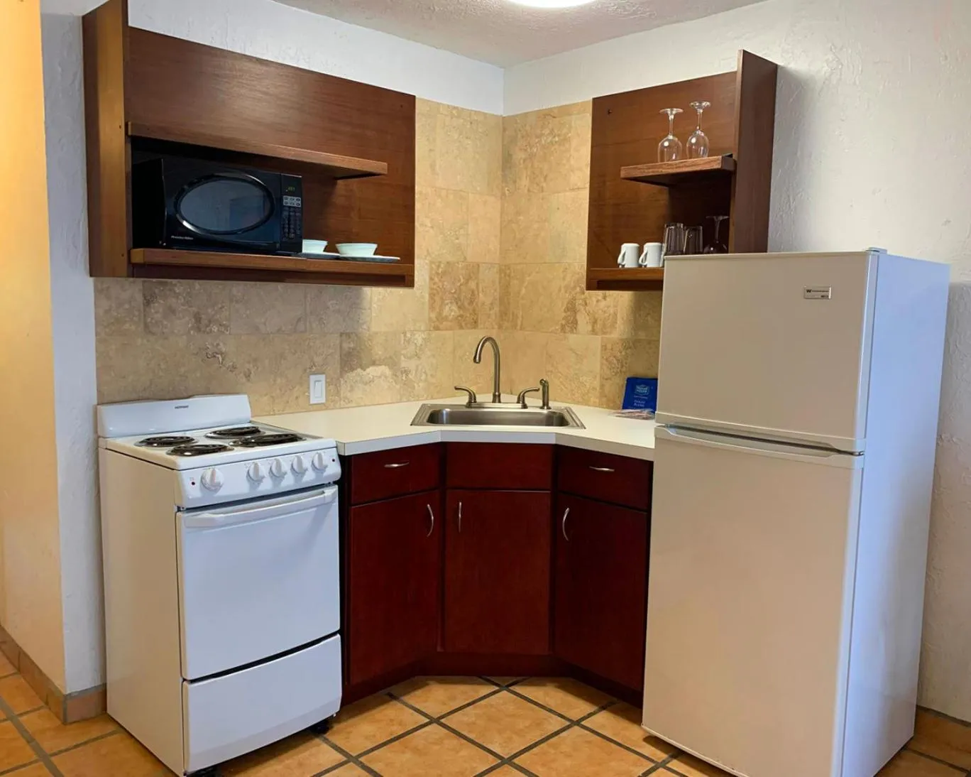 Kitchen or kitchenette in Sand Castle on the Beach - Adults Only