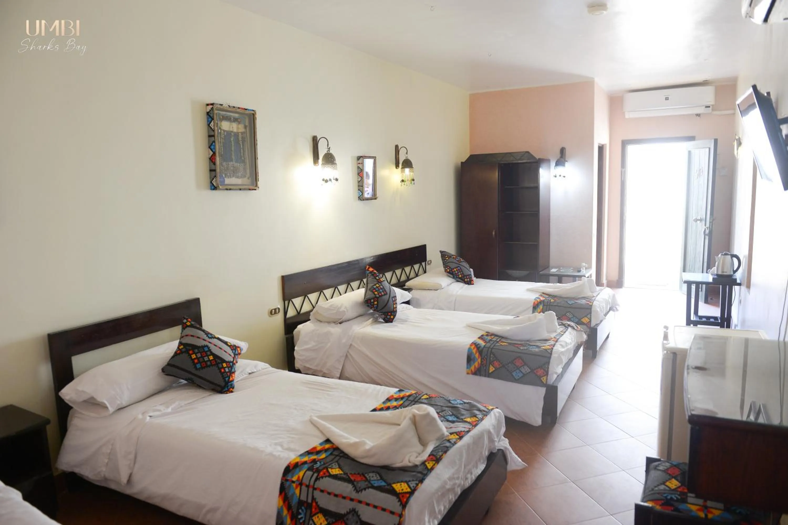 Bed in Umbi Sharks Bay Diving Village